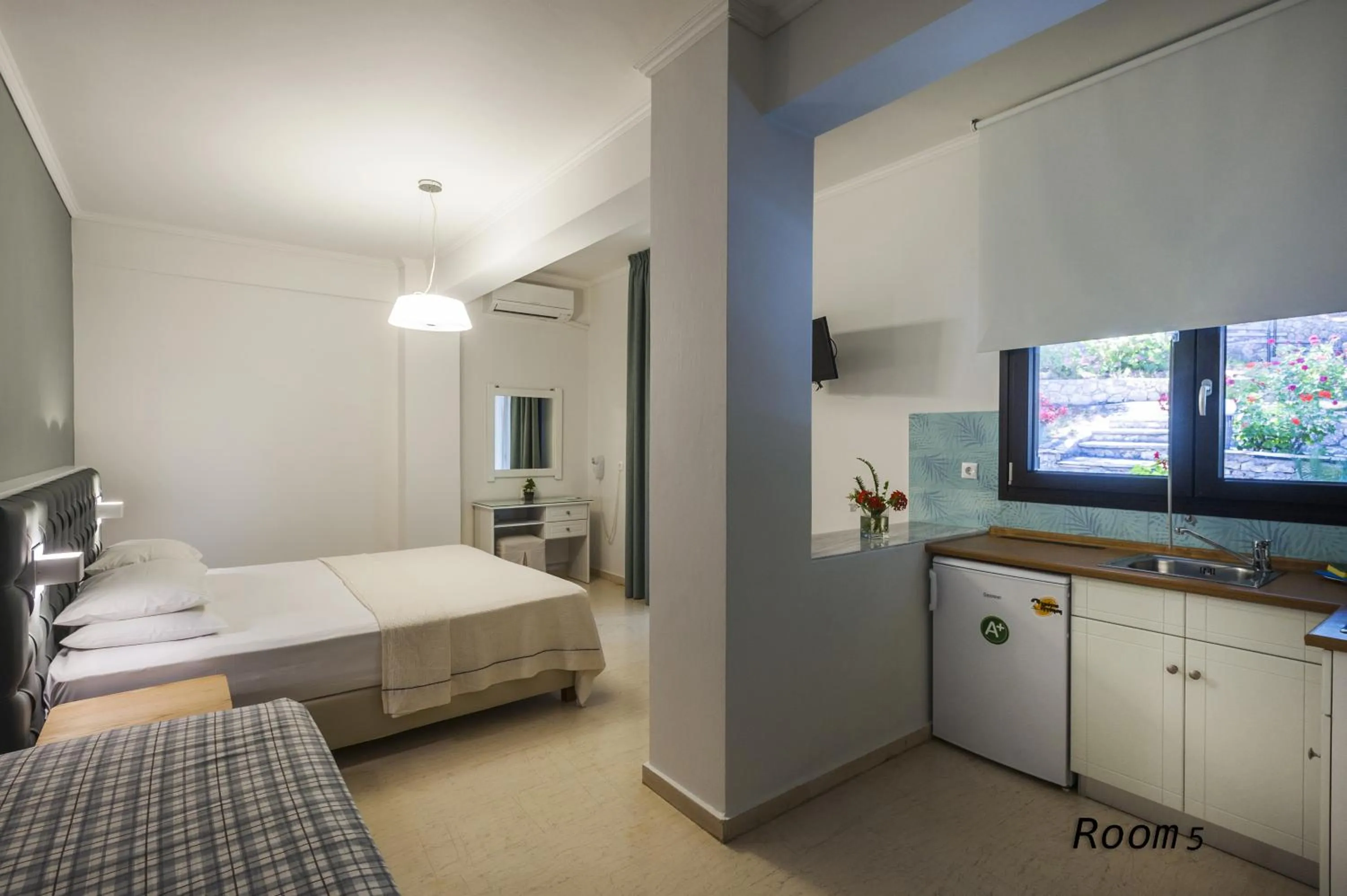 Kitchen or kitchenette, Bed in Hotel Oriana - Adults Only
