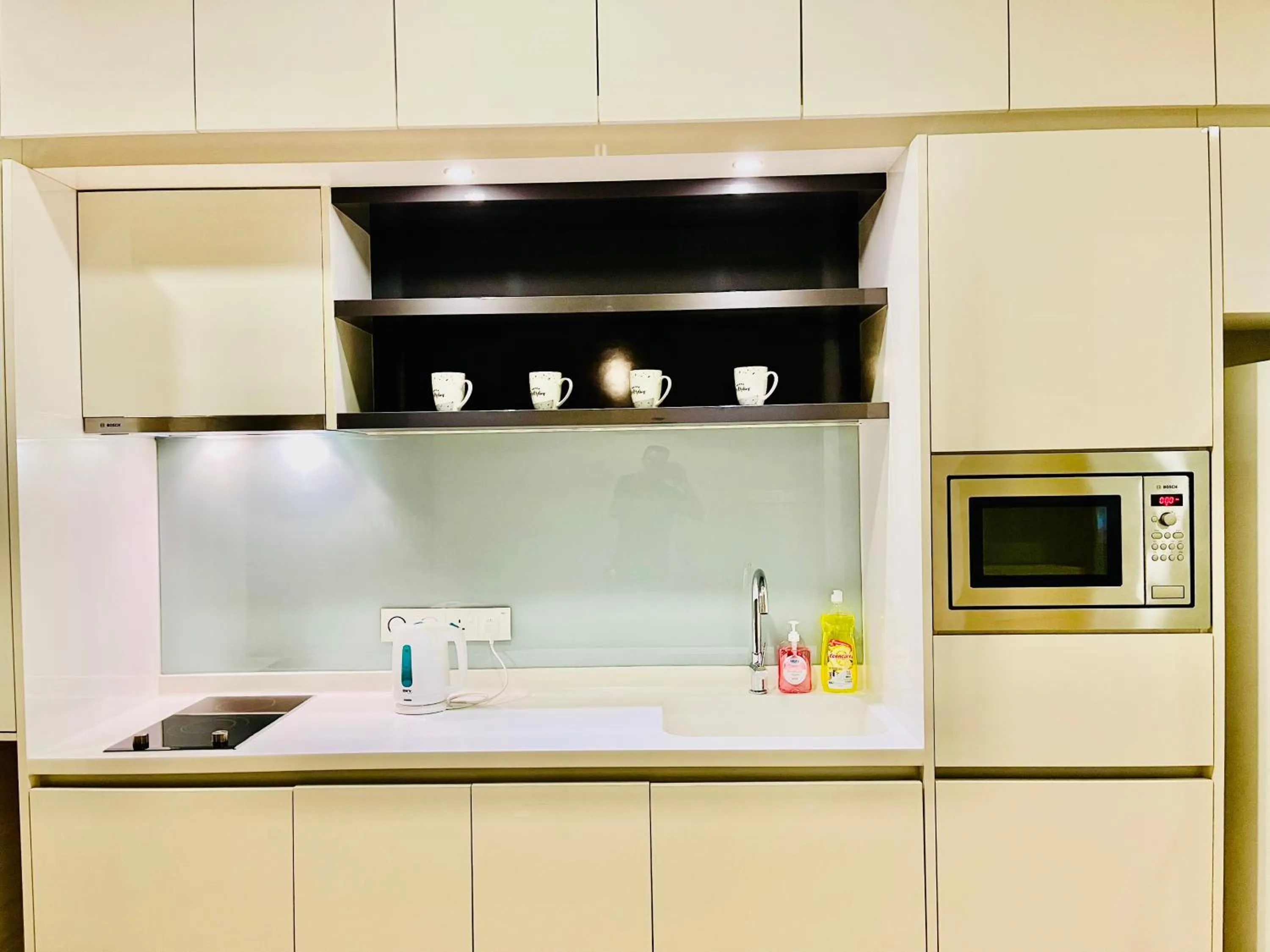 Kitchen or kitchenette in Castle Quest Residence