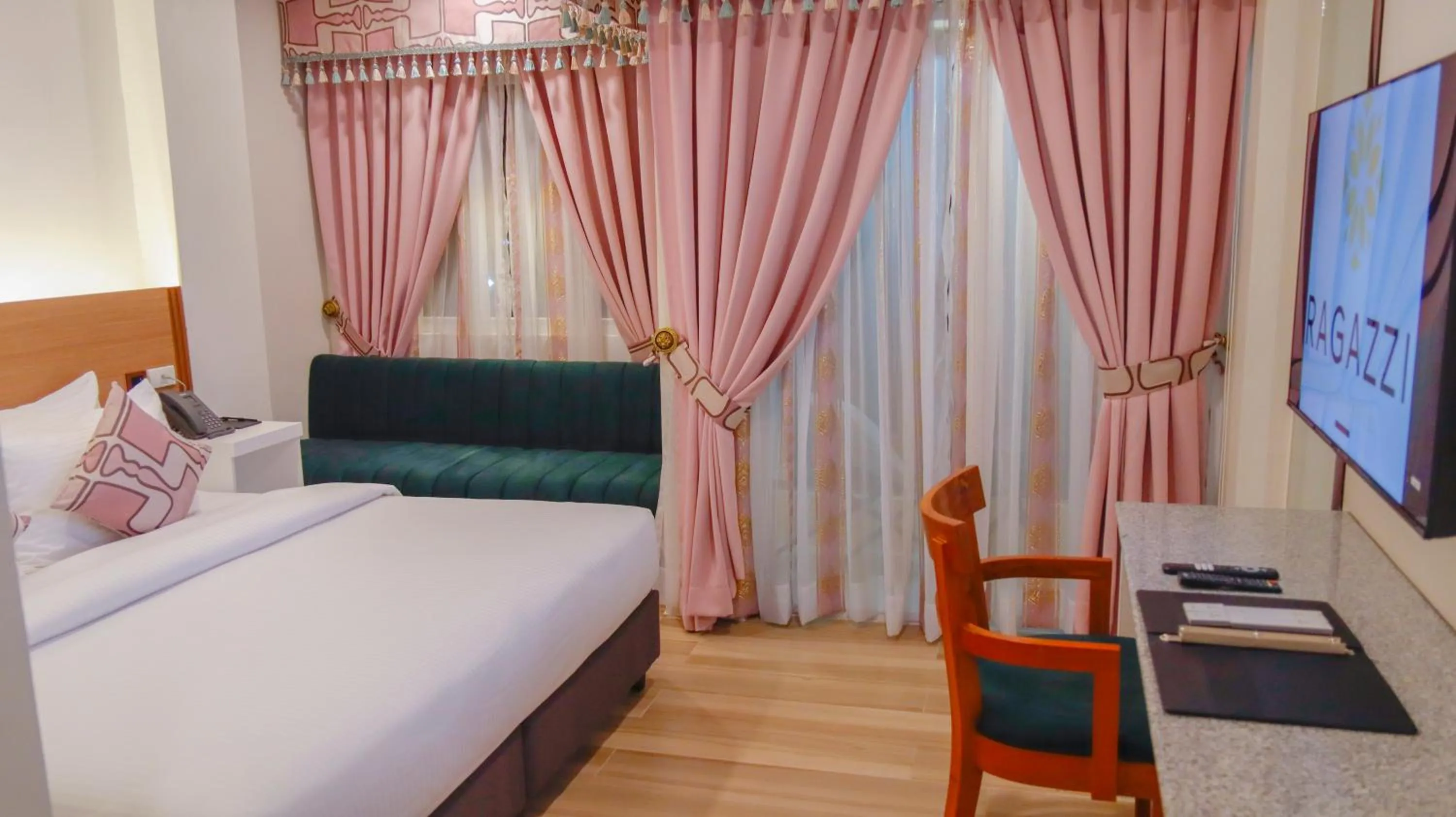 Bed in Ragazzi Resort Hotel