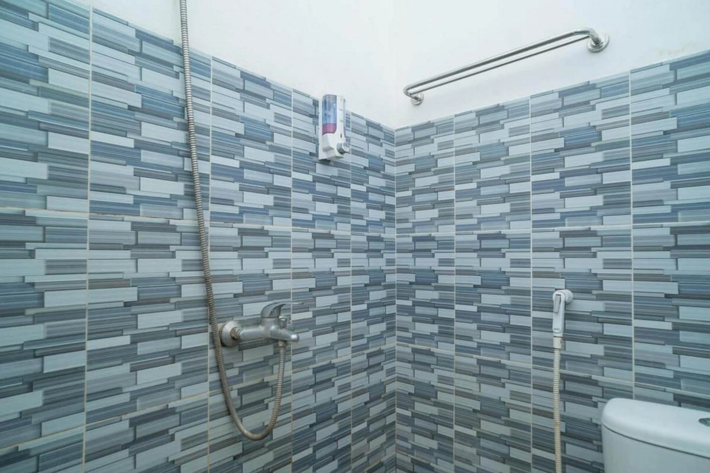 Bathroom in RedDoorz Syariah near Lippo Plaza Sidoarjo