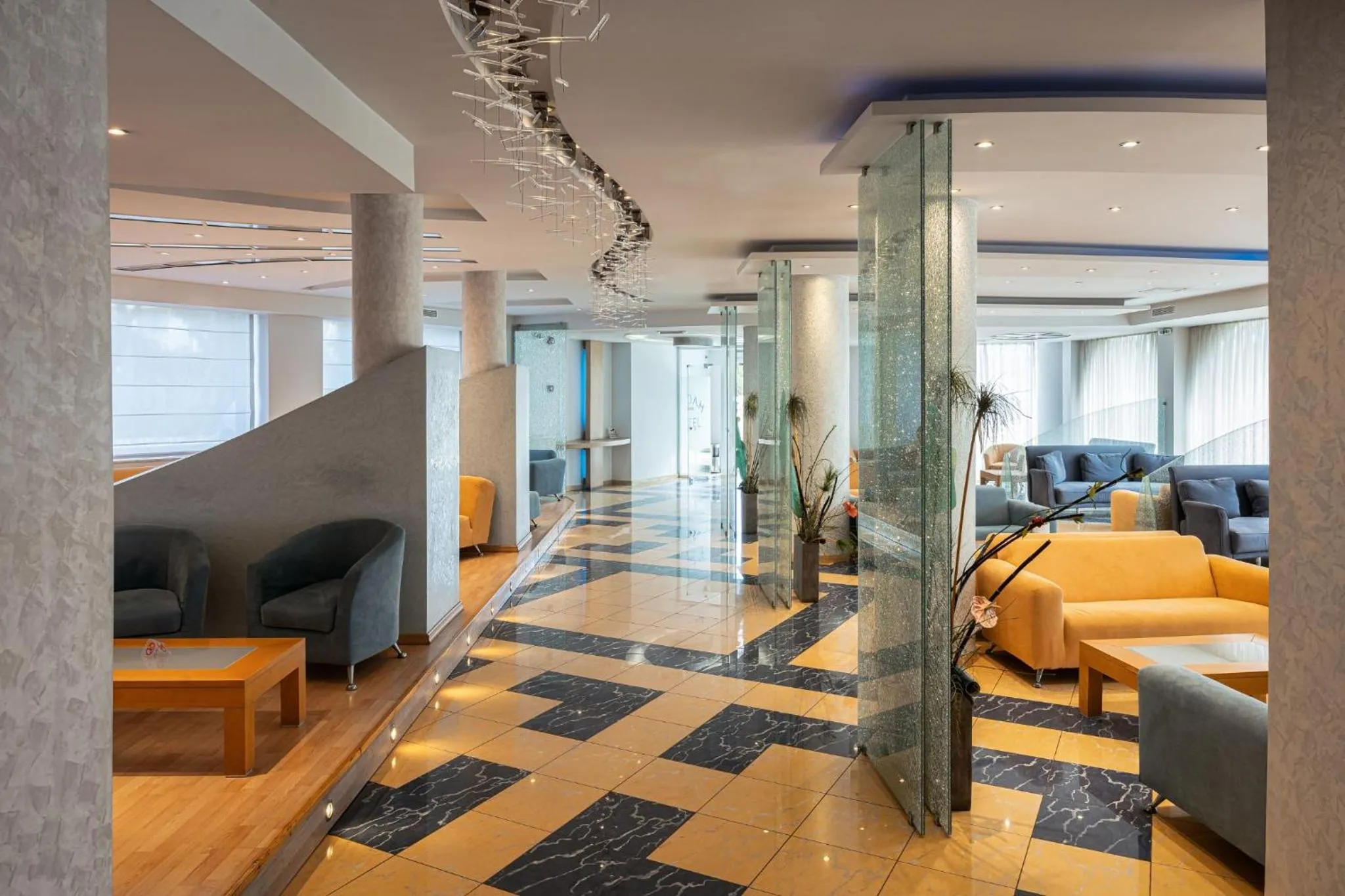 Communal lounge/ TV room in Kreoli Suites Glyfada