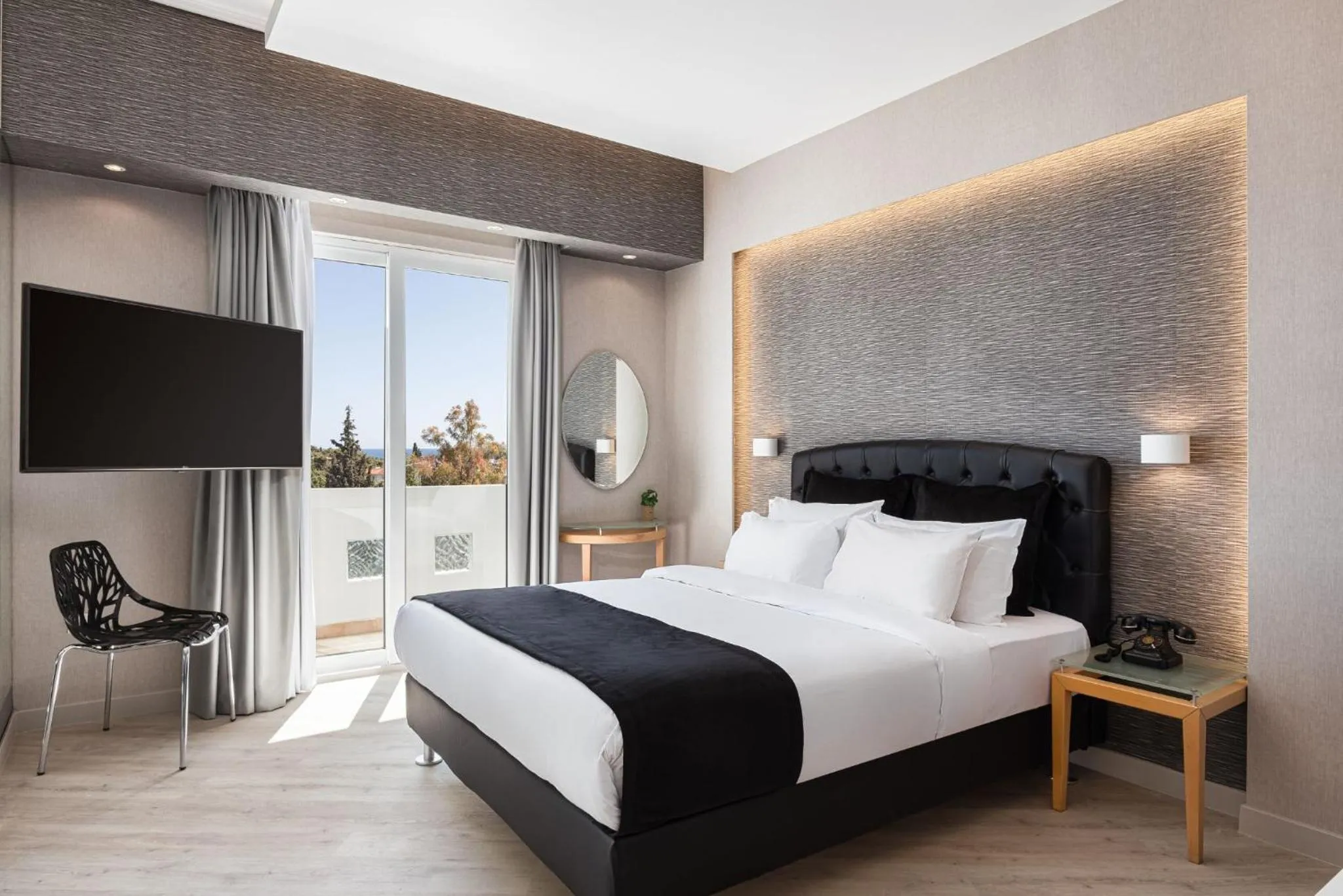 Bed in Kreoli Suites Glyfada
