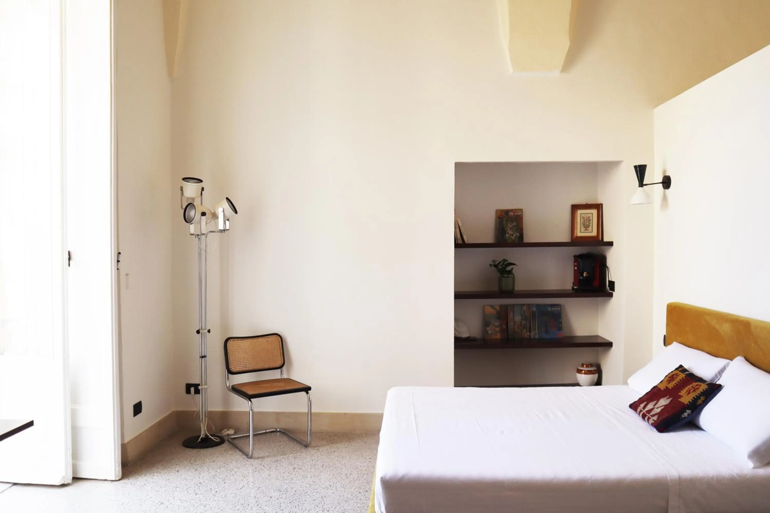 Bed in Roiss Haus Suites