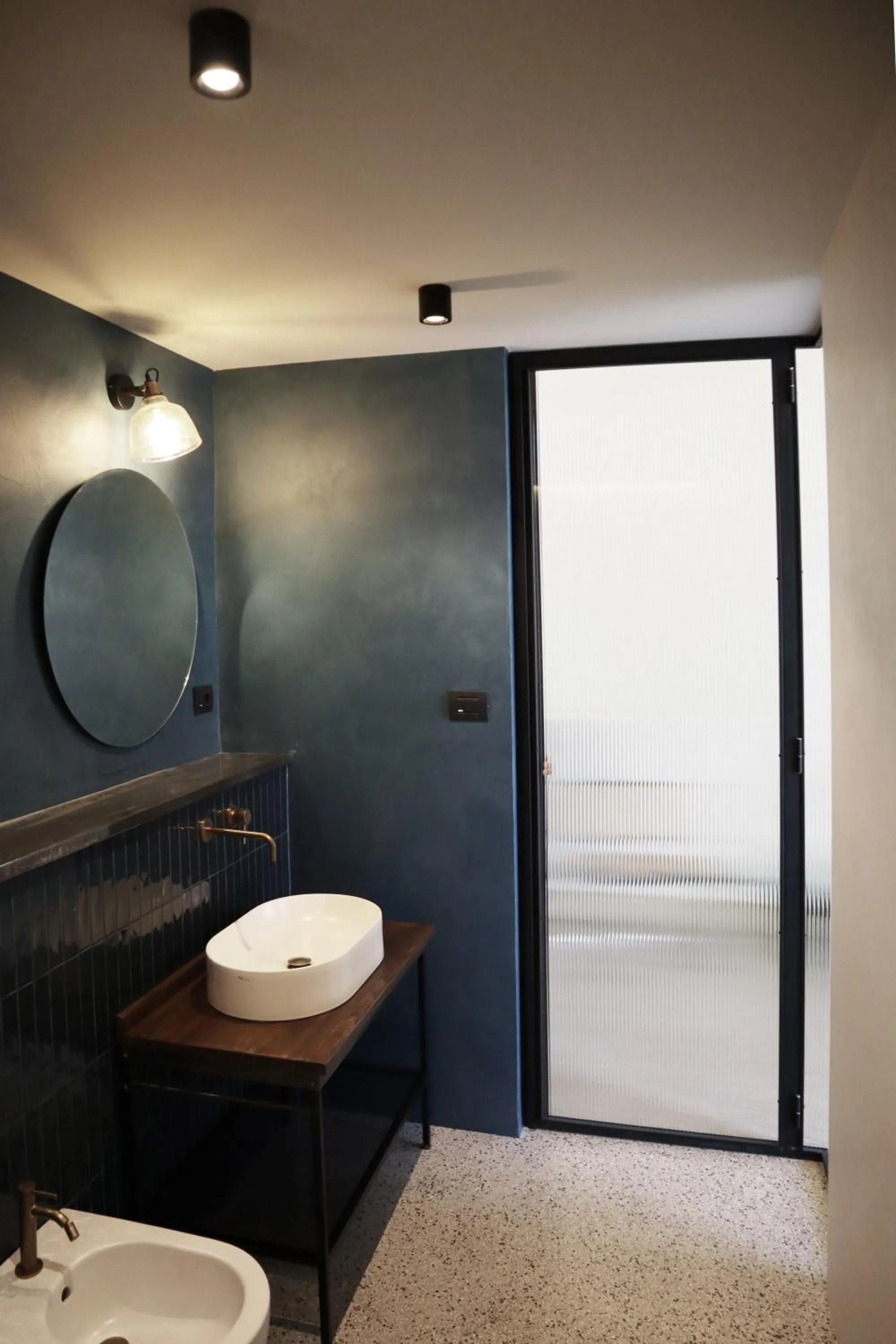 Bathroom in Roiss Haus Suites