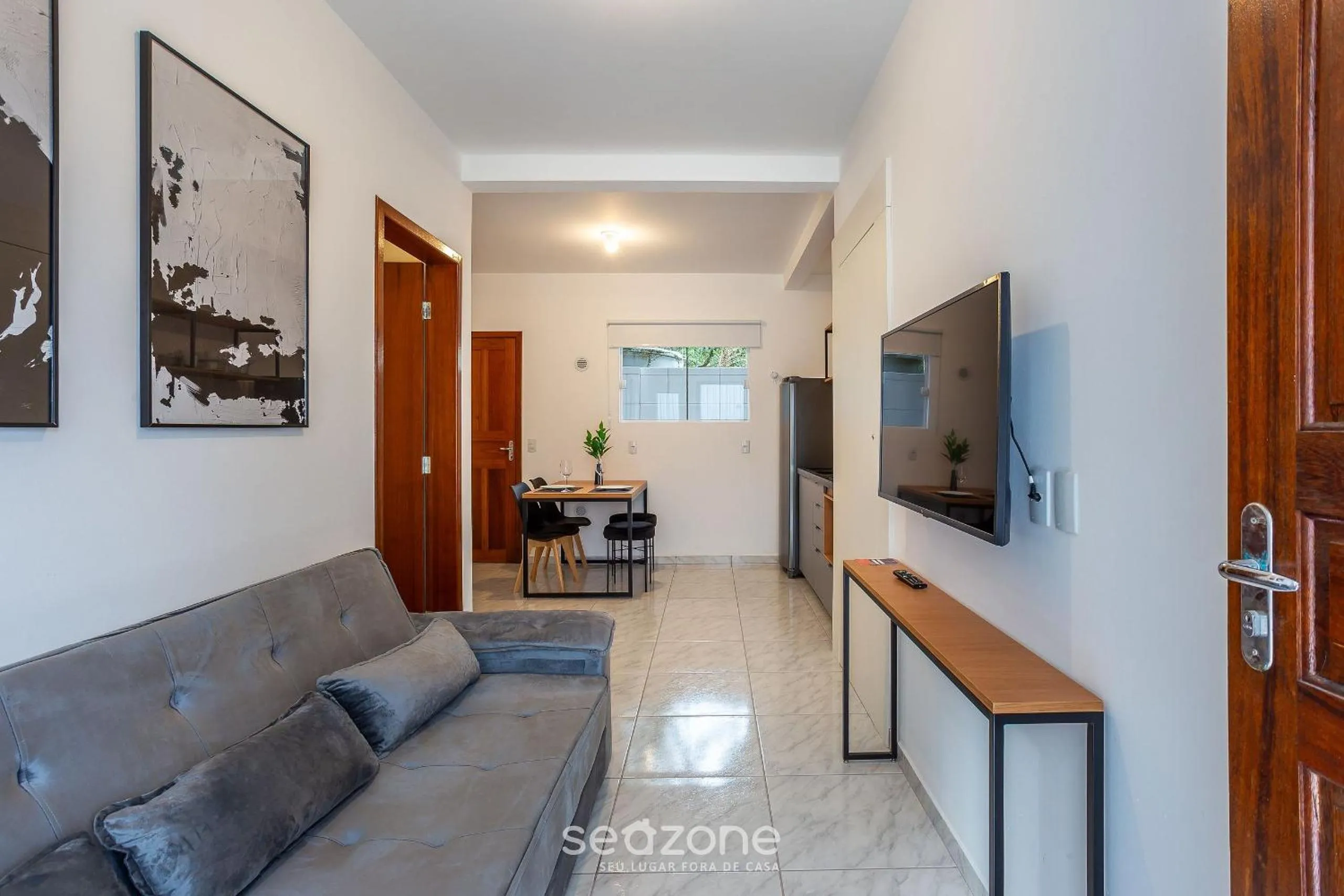 TV and multimedia in Apartamentos em Jurerê - JMA