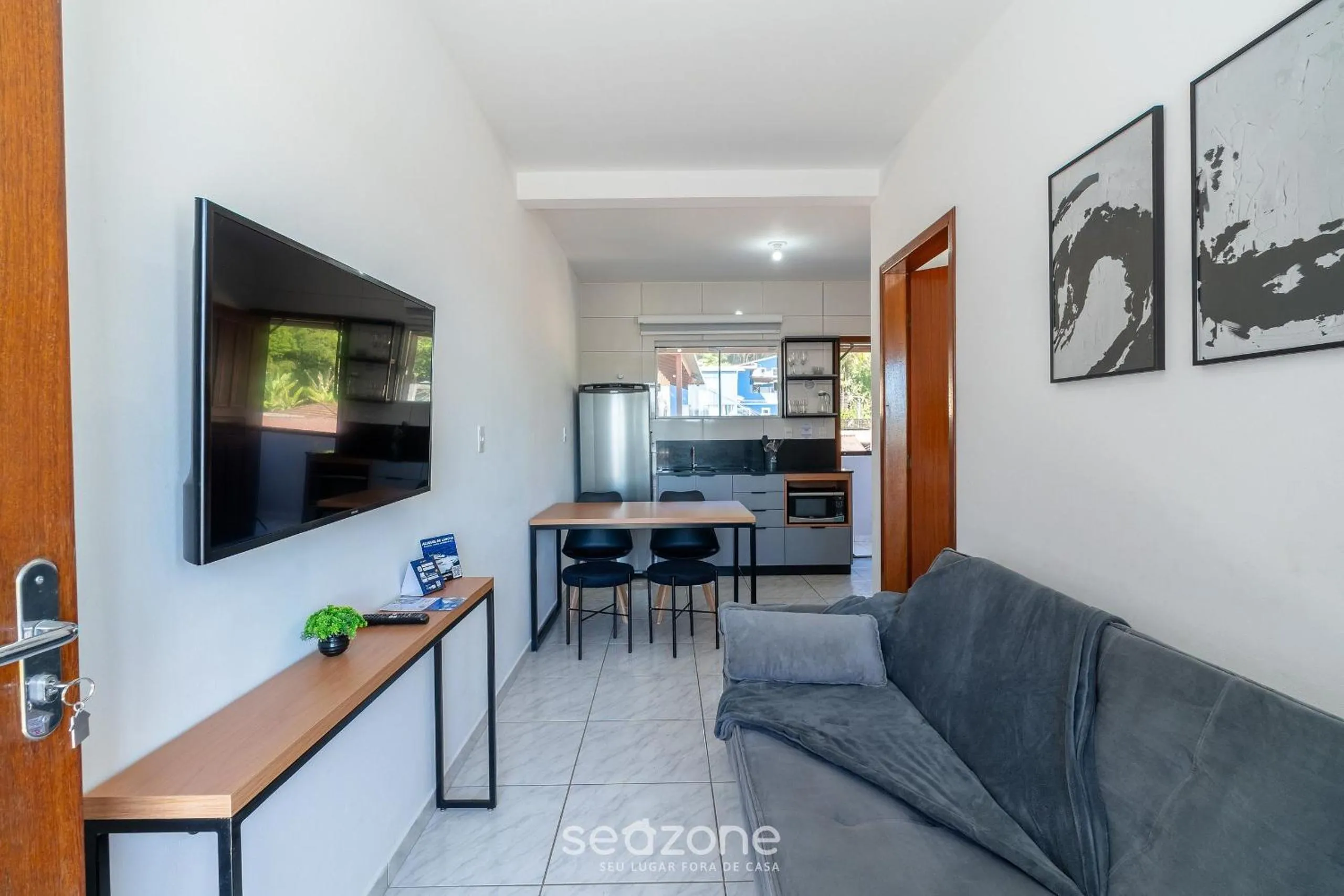 TV and multimedia in Apartamentos em Jurerê - JMA