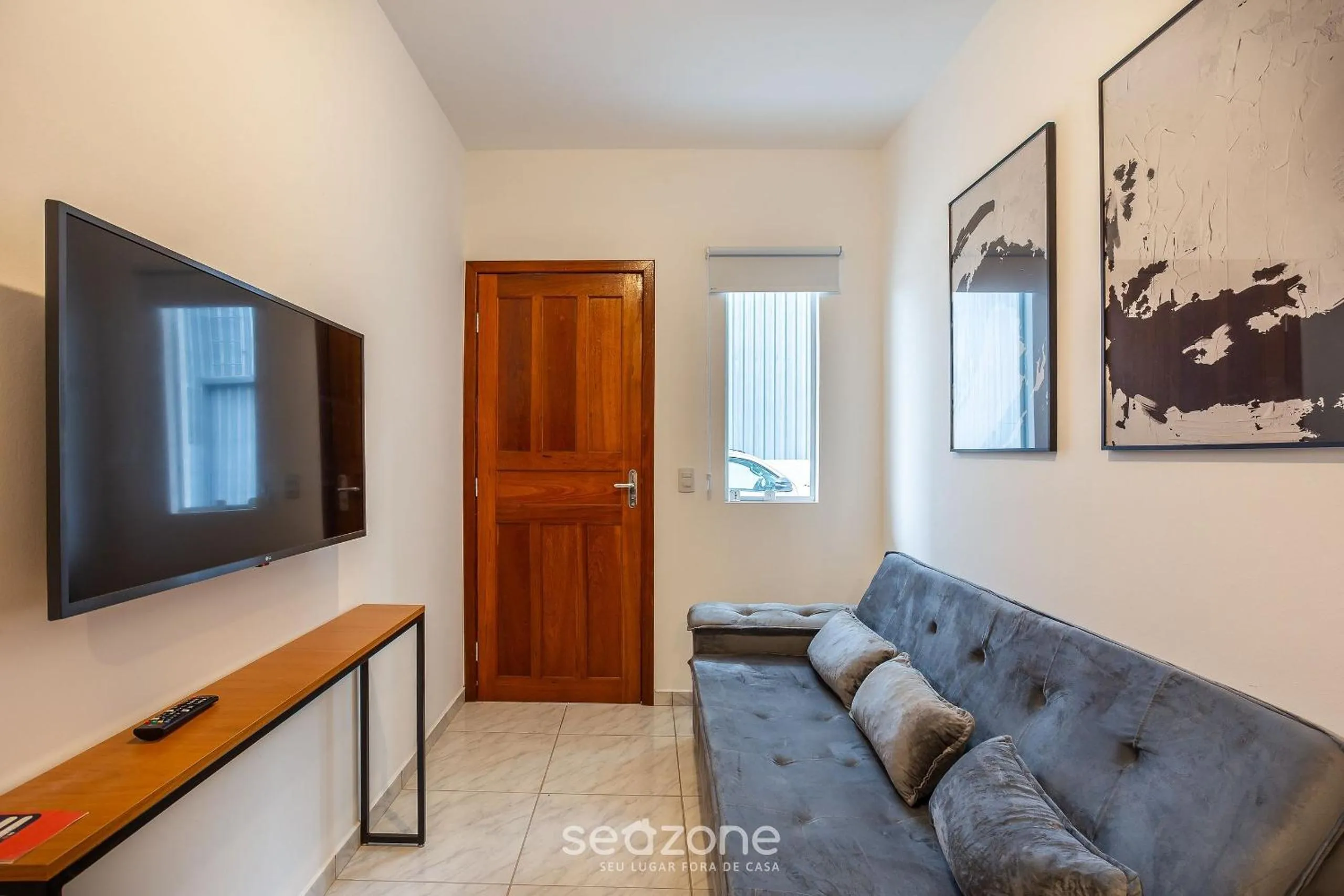 TV and multimedia in Apartamentos em Jurerê - JMA