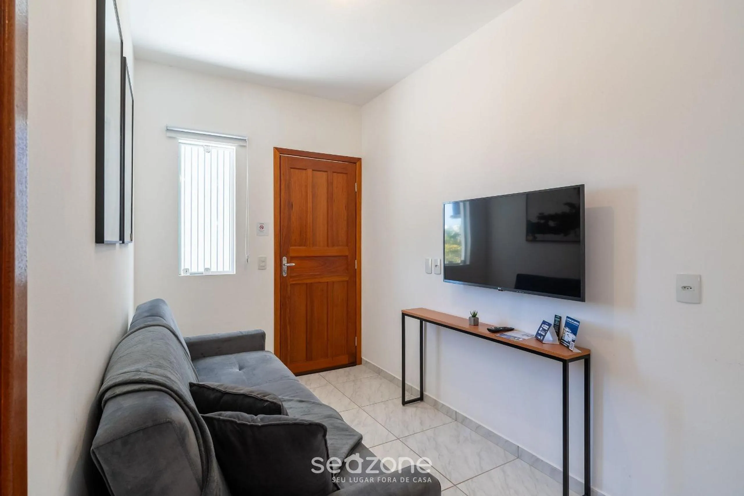 TV and multimedia in Apartamentos em Jurerê - JMA
