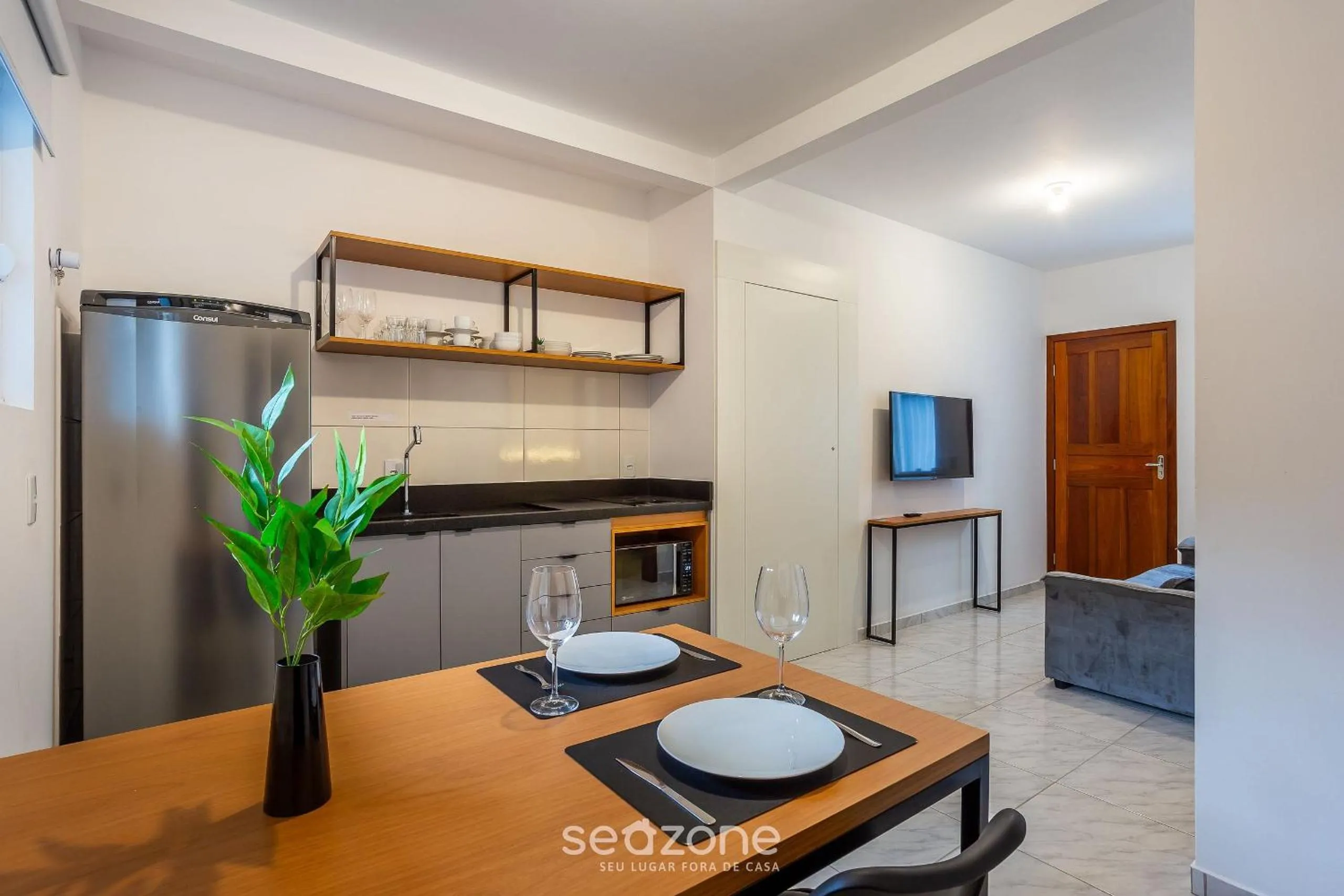 TV and multimedia in Apartamentos em Jurerê - JMA