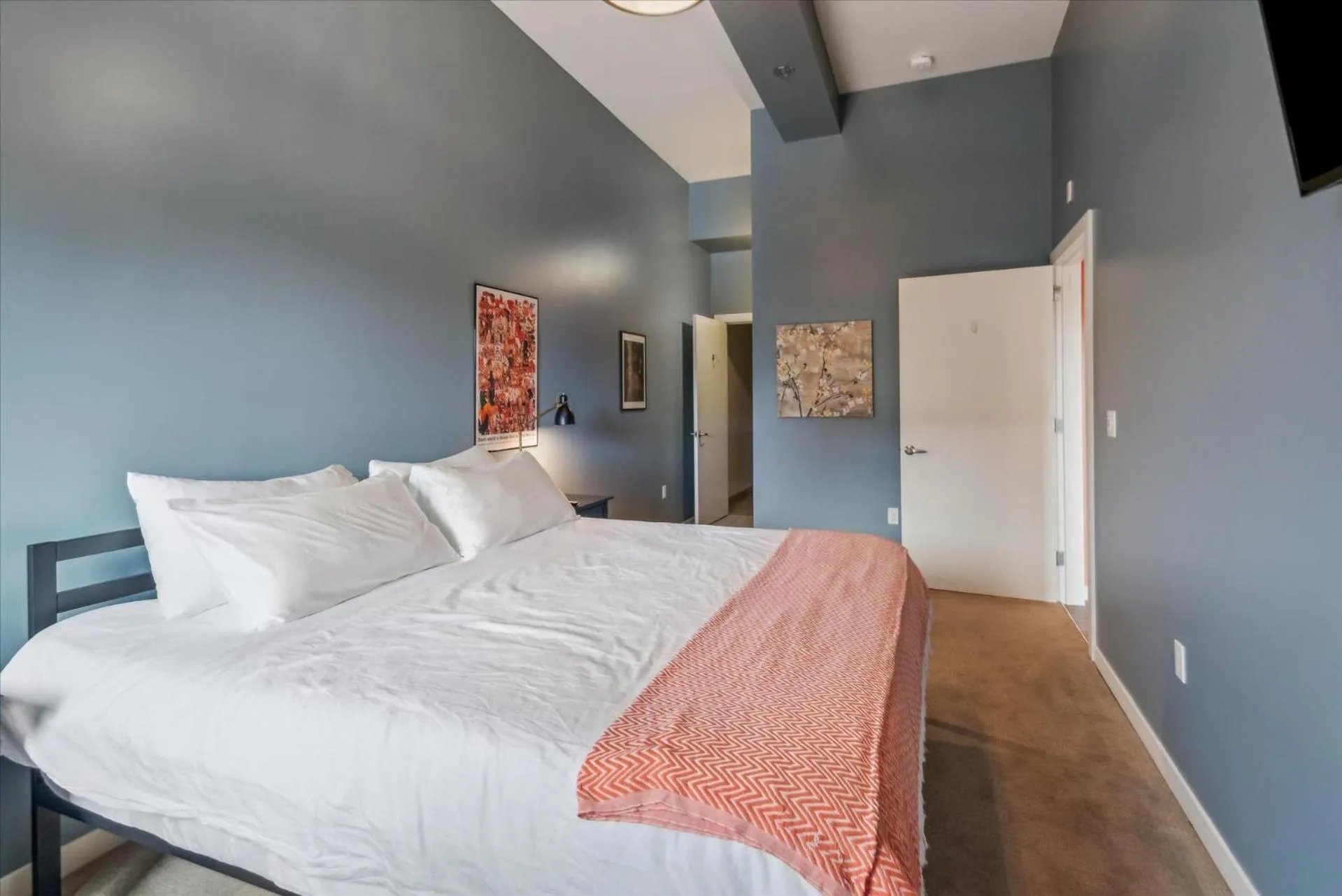 Bed in VioletSuitesPDX Boutique Hotel