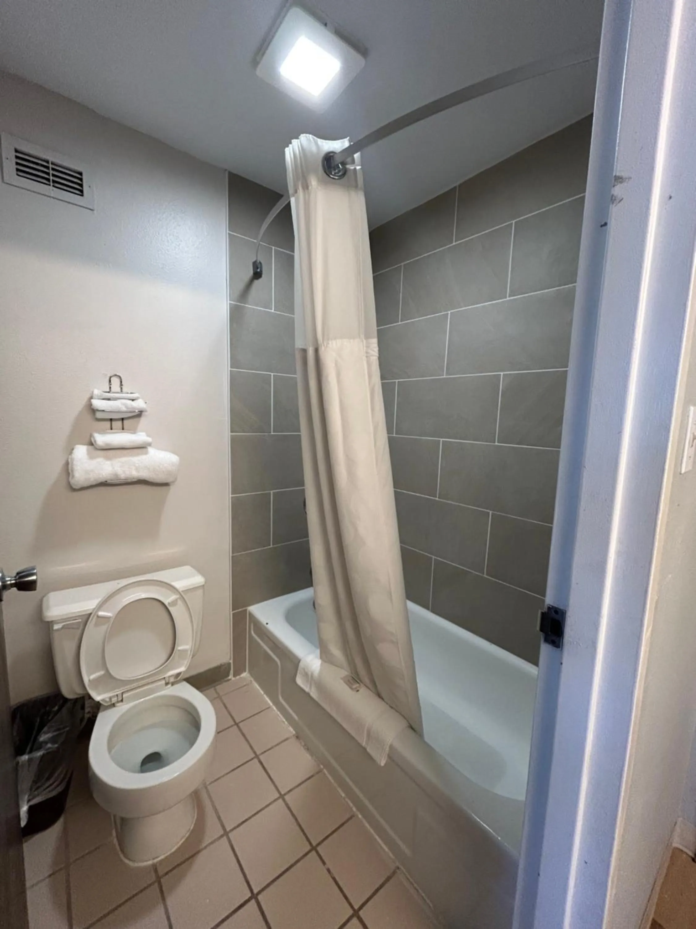 Bathroom in Super 8 by Wyndham Sterling CO