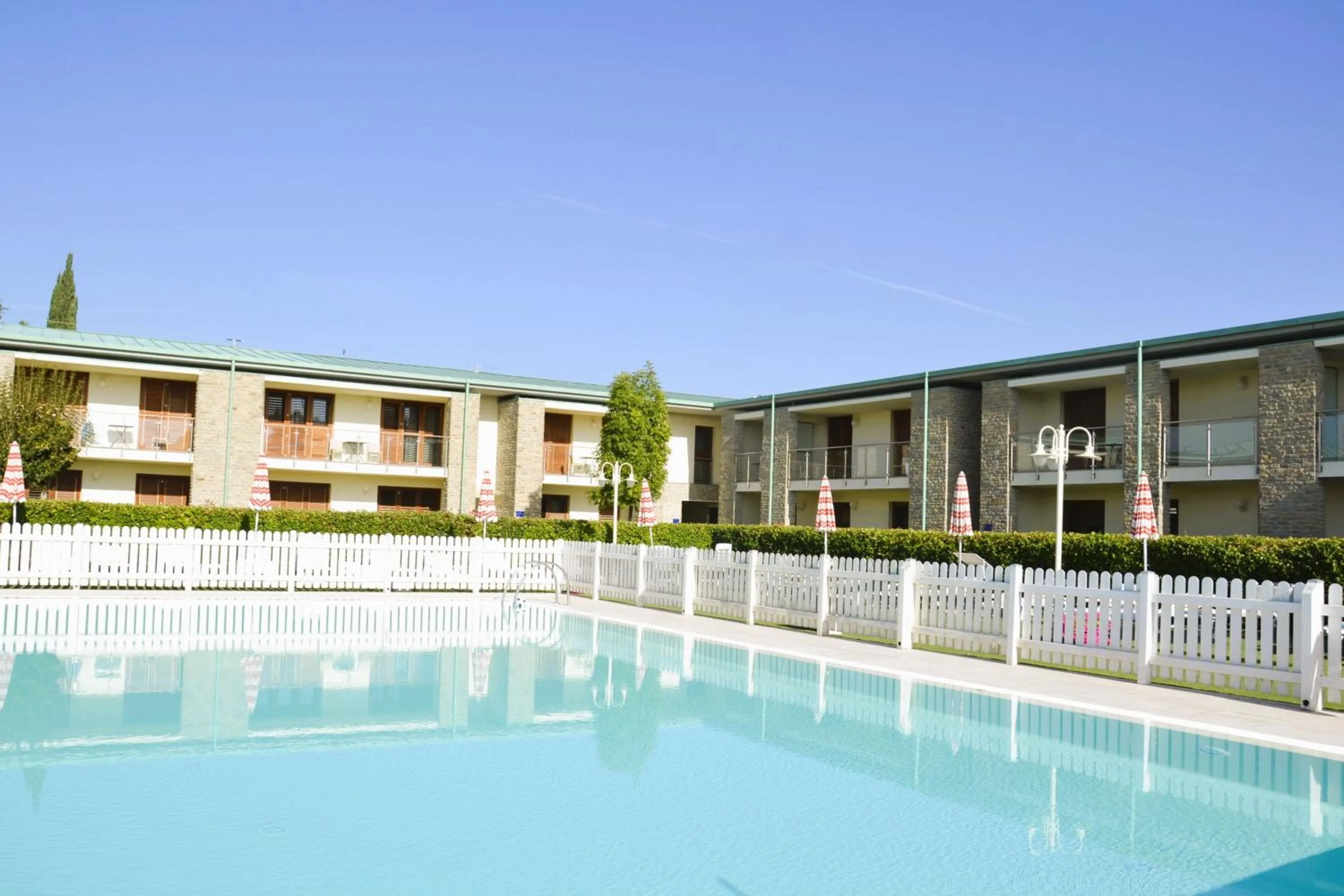 Swimming pool in ISA-Residence with swimming-pool in Barberino-Tavernelle, apartments with air conditioning and private outdoor area