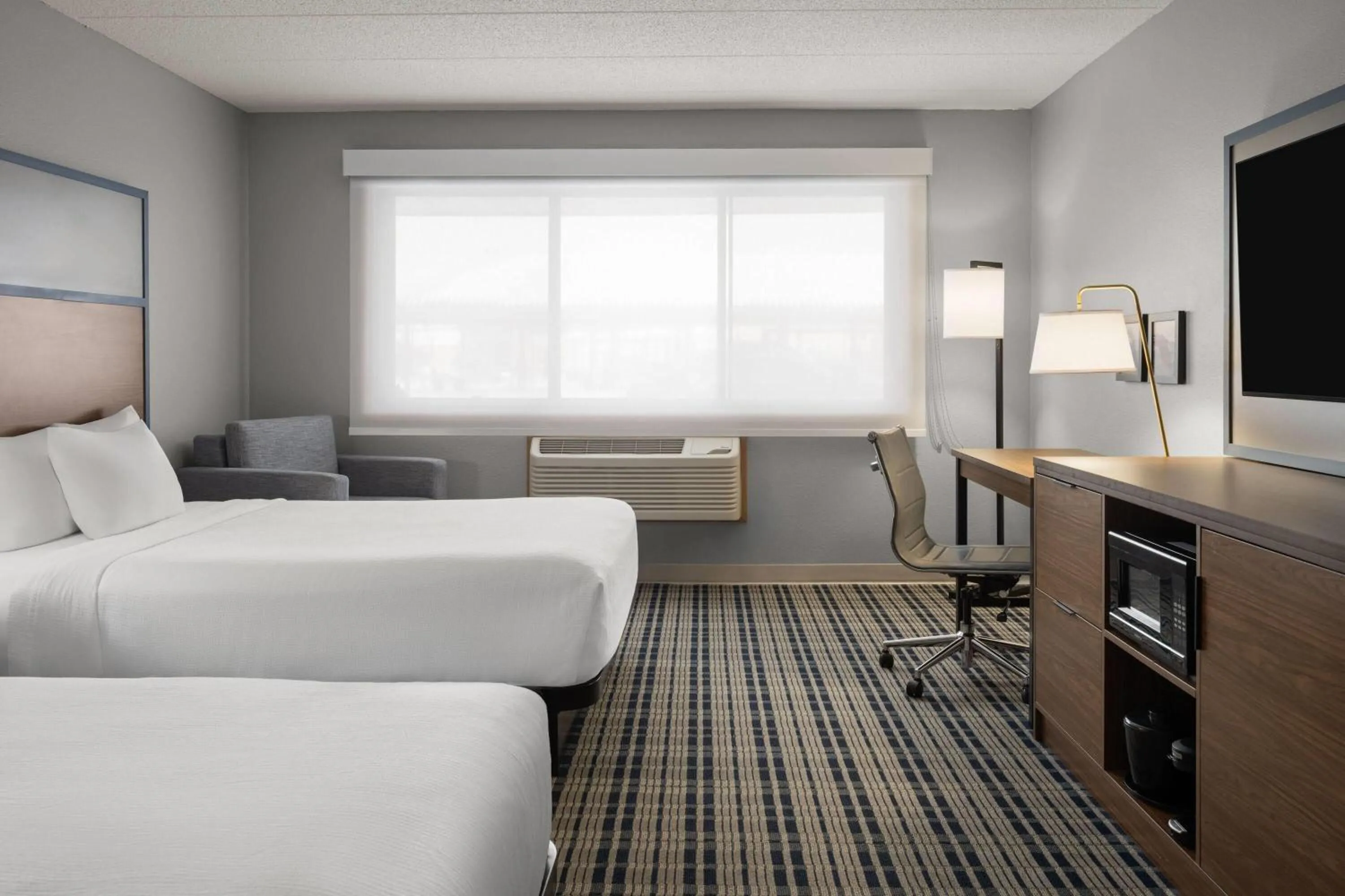 Photo of the whole room, Bed in AmericInn by Wyndham Grand Forks