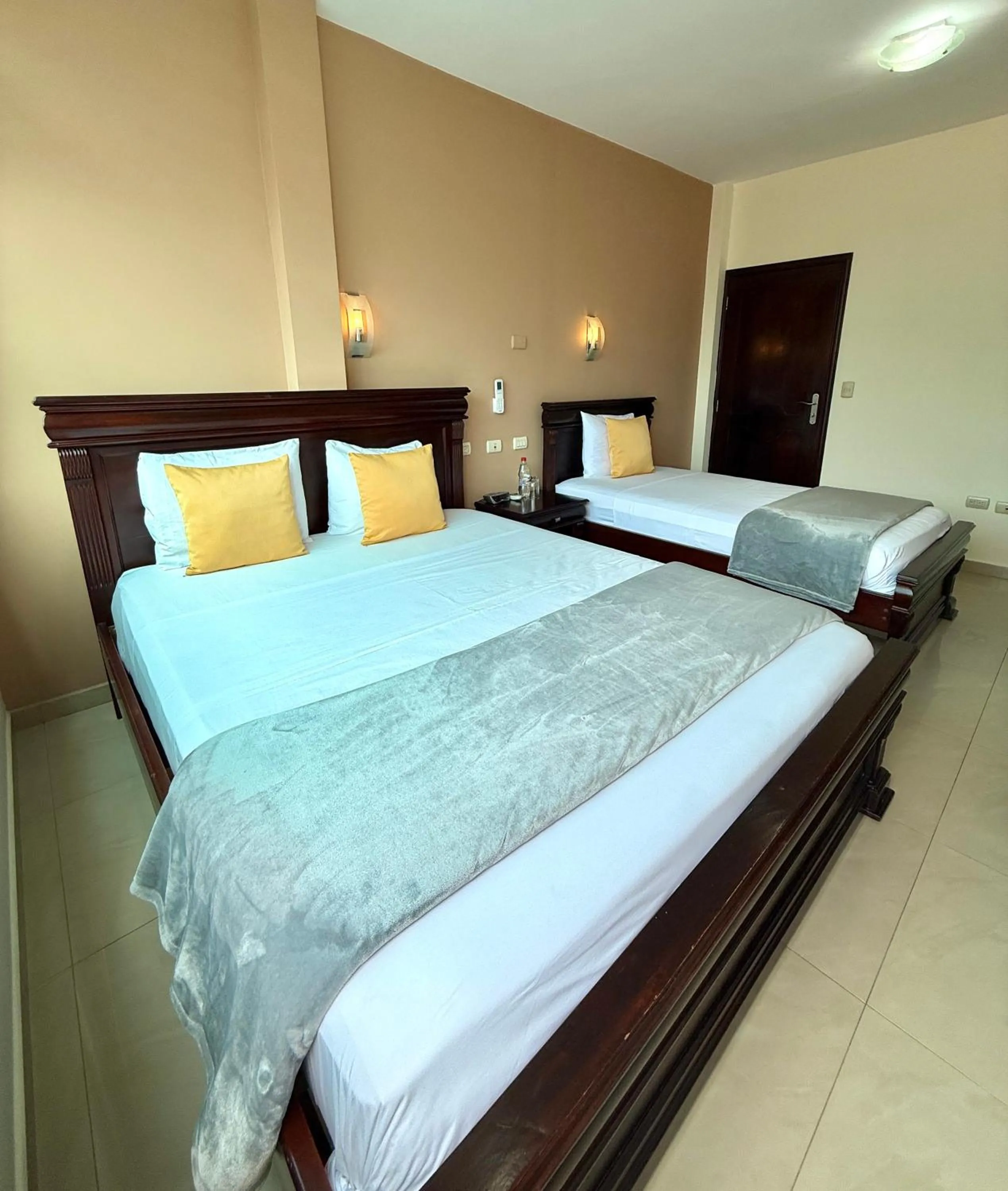 Bed in Hotel Flamingo