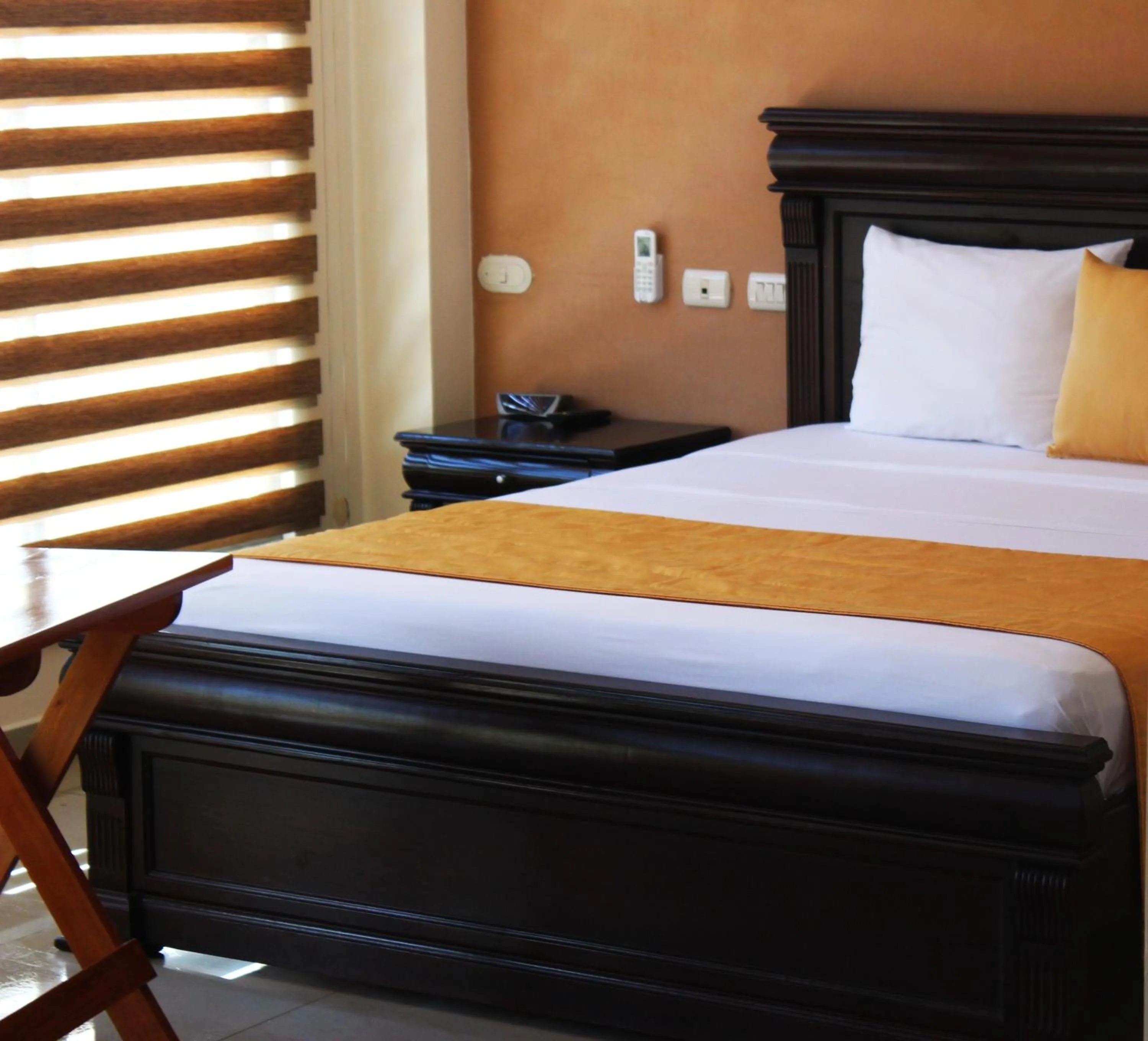 Bed in Hotel Flamingo