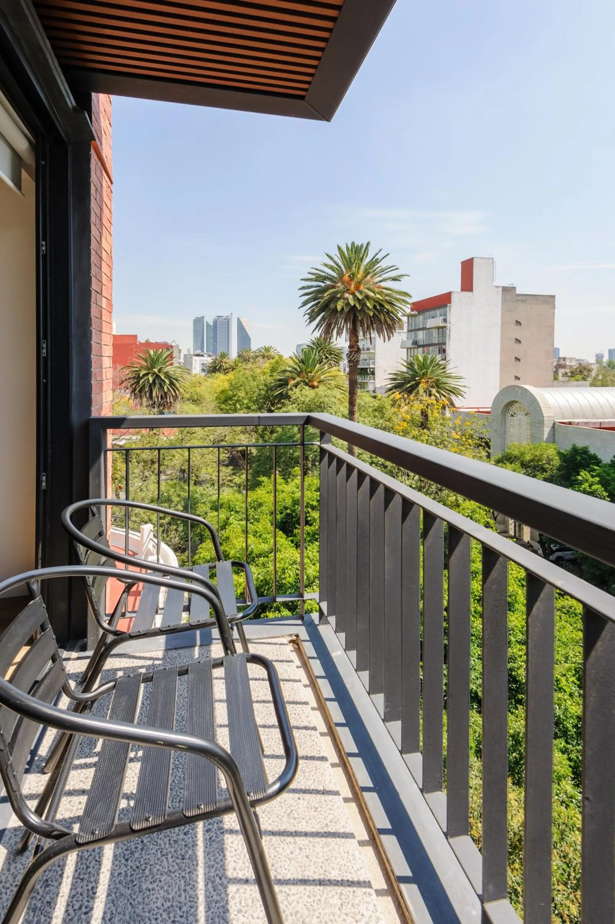 Balcony/Terrace in Nuevo Leon 155 by Wynwood House