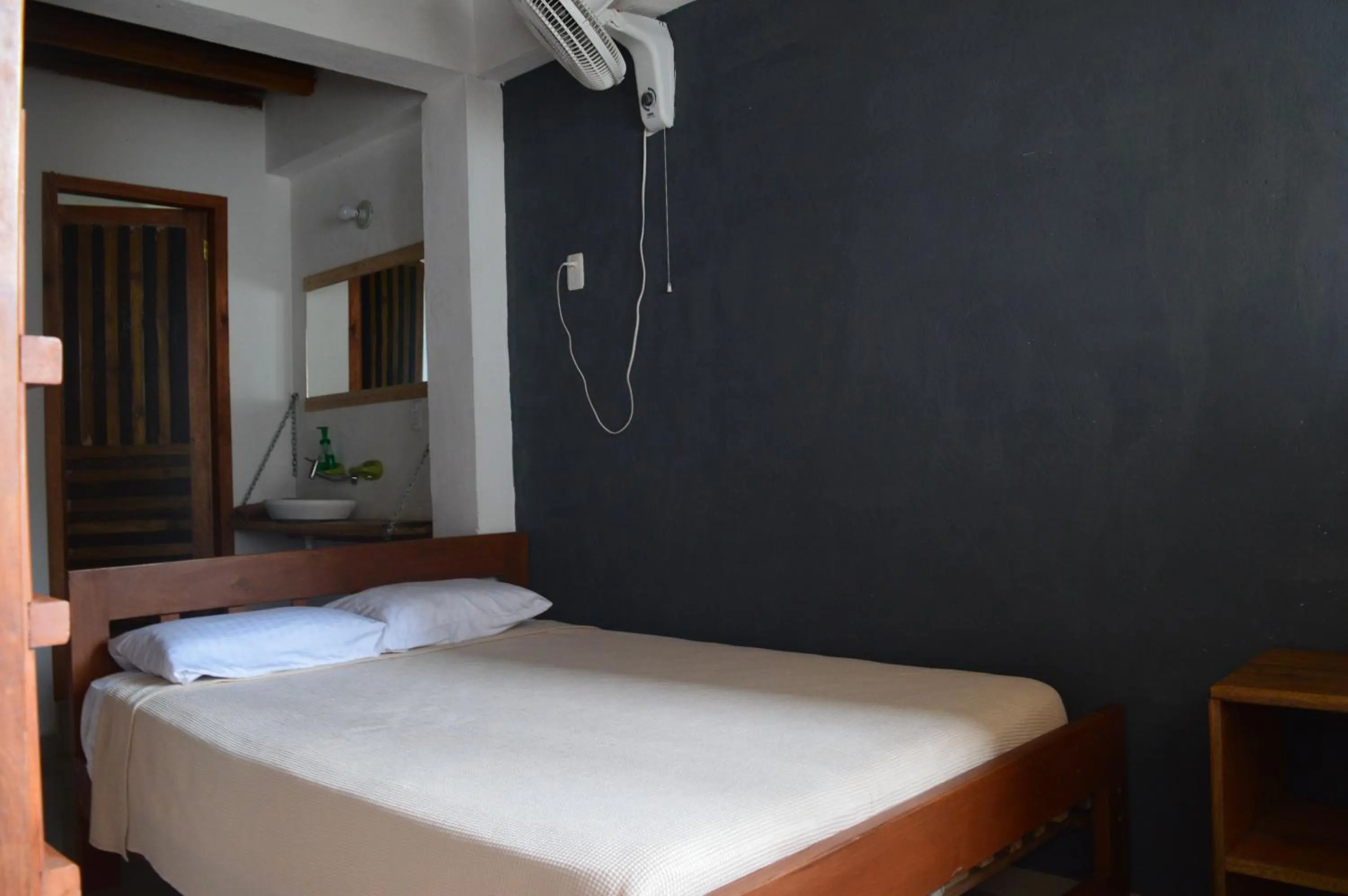 Bed in La Facha Hostal Restaurant Surf