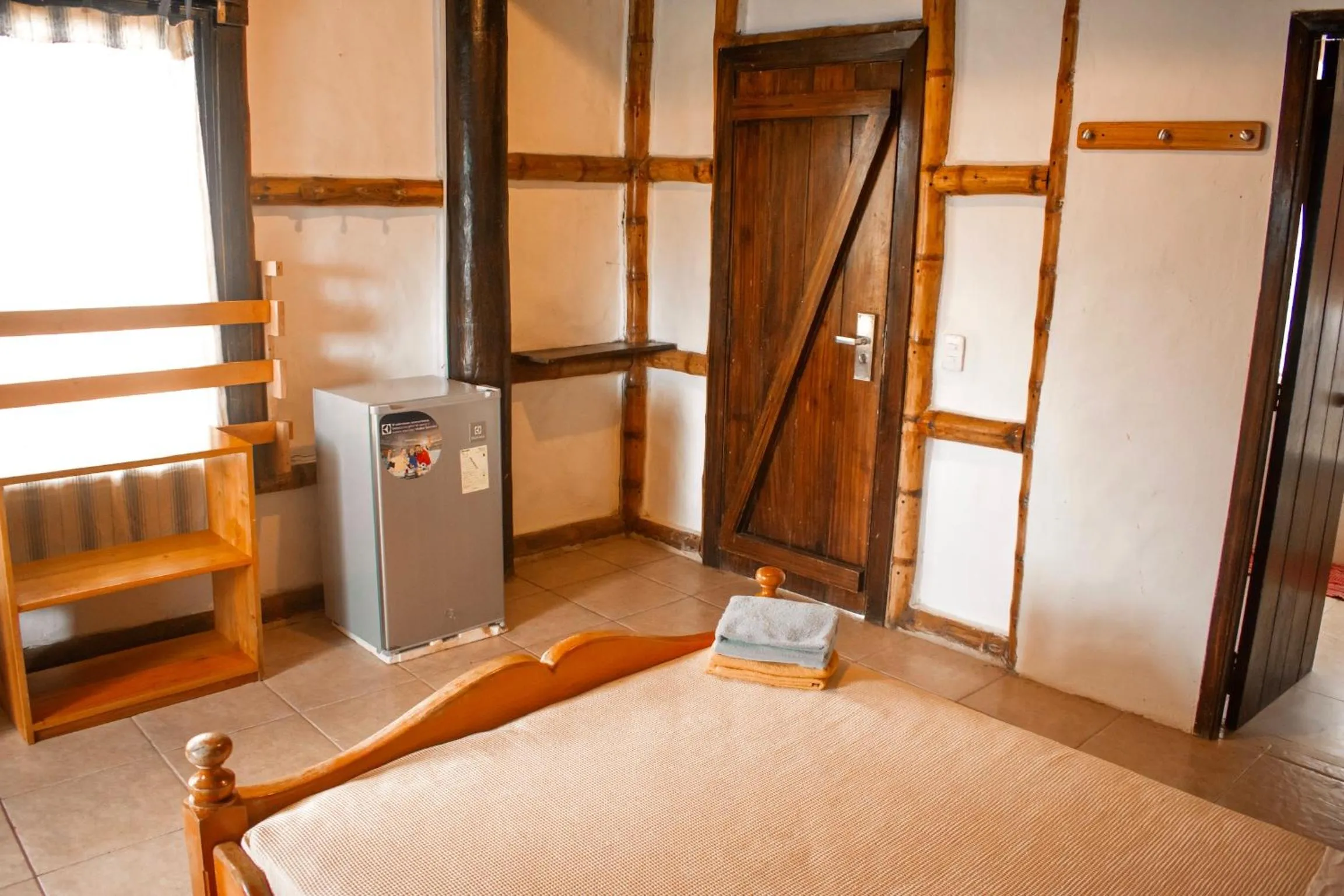 Seating area, Bed in La Facha Hostal Restaurant Surf