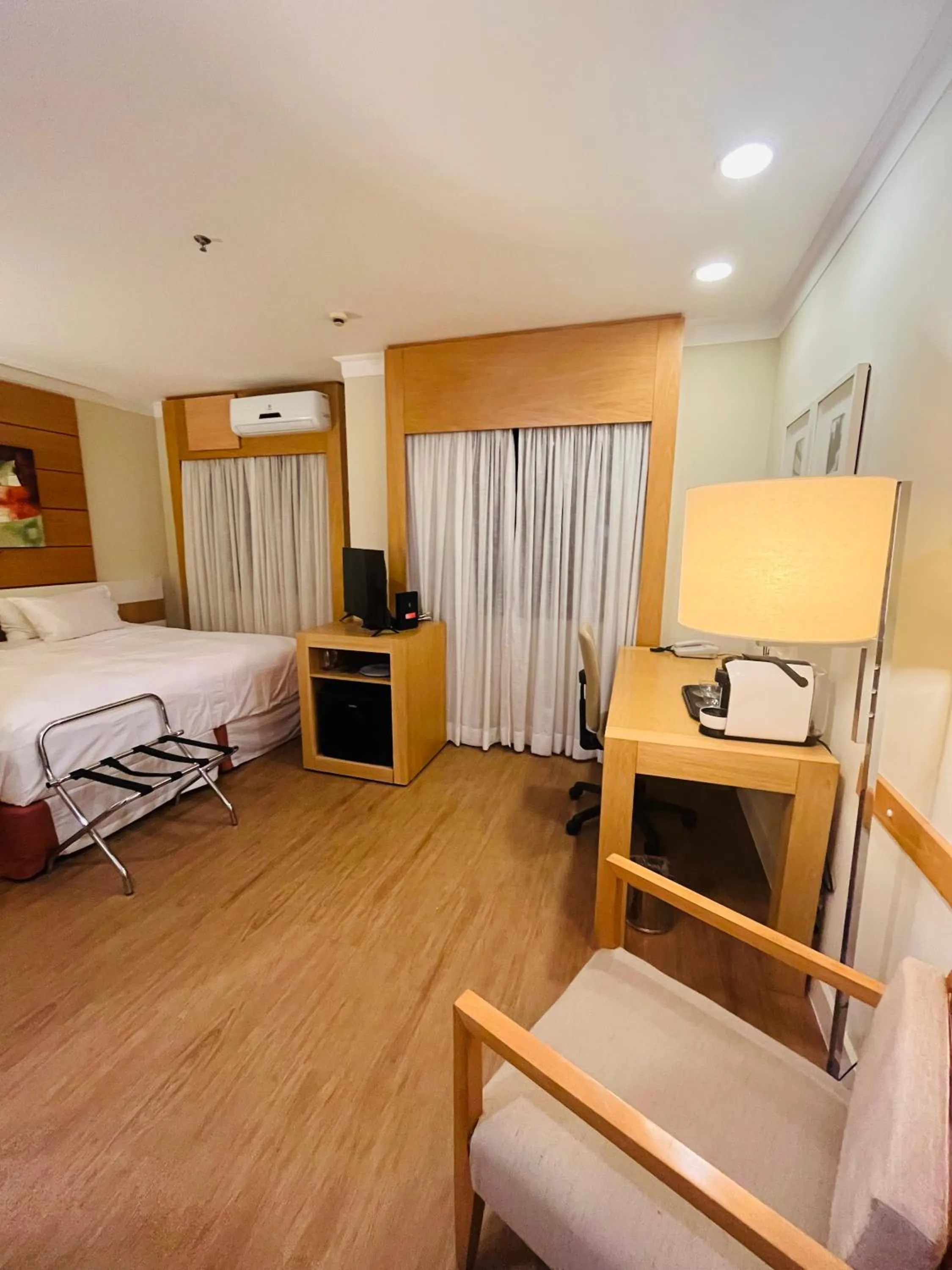 Bed in Quarto de hotel de luxo Congonhas