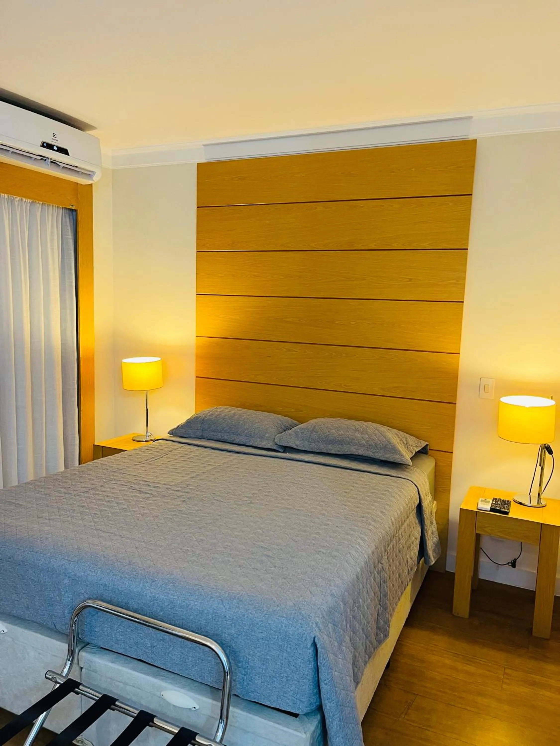 Bed in Quarto de hotel de luxo Congonhas