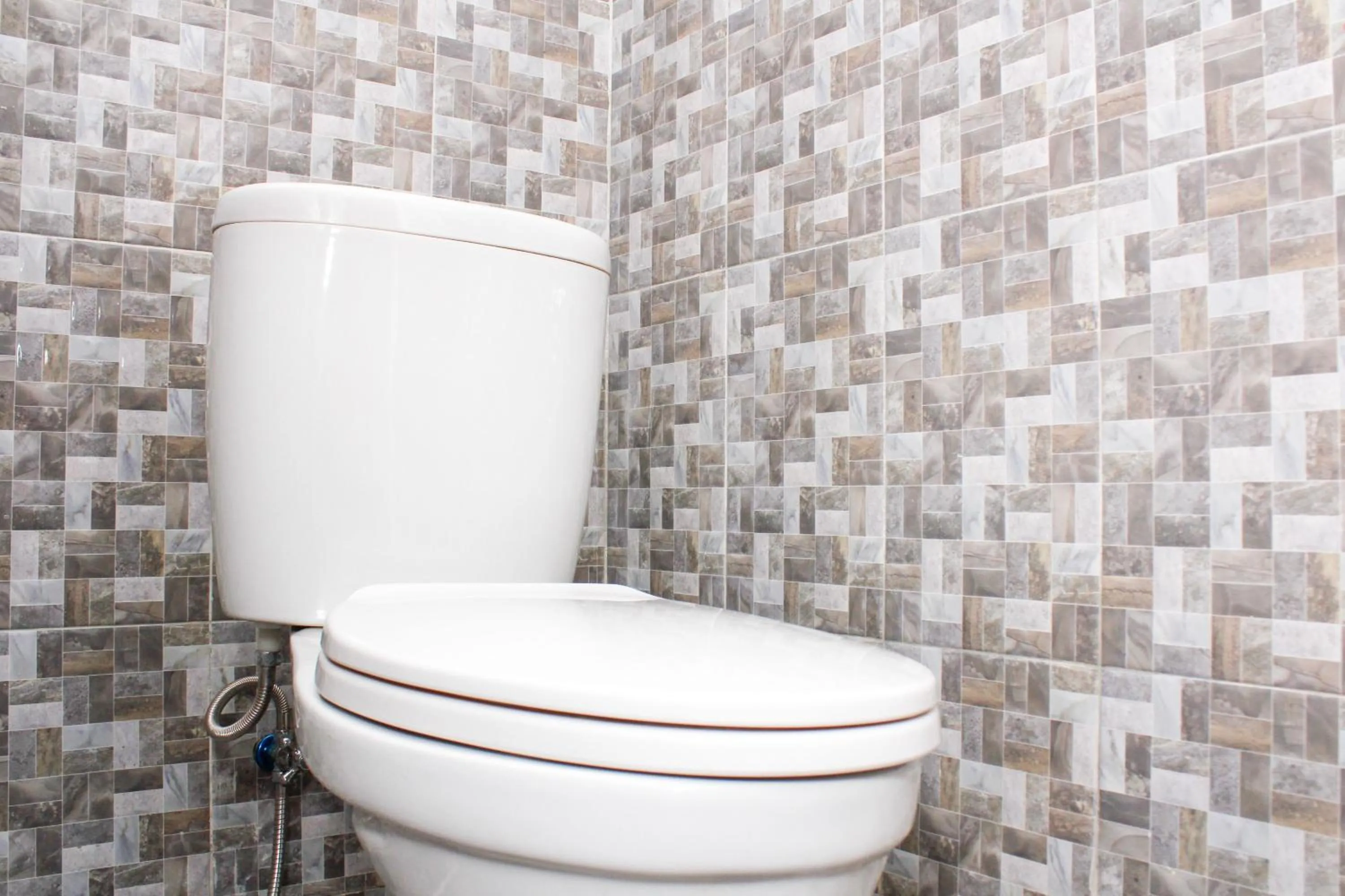 Bathroom in RedDoorz Syariah near Kawasan Wisata Gunung Prau Dieng