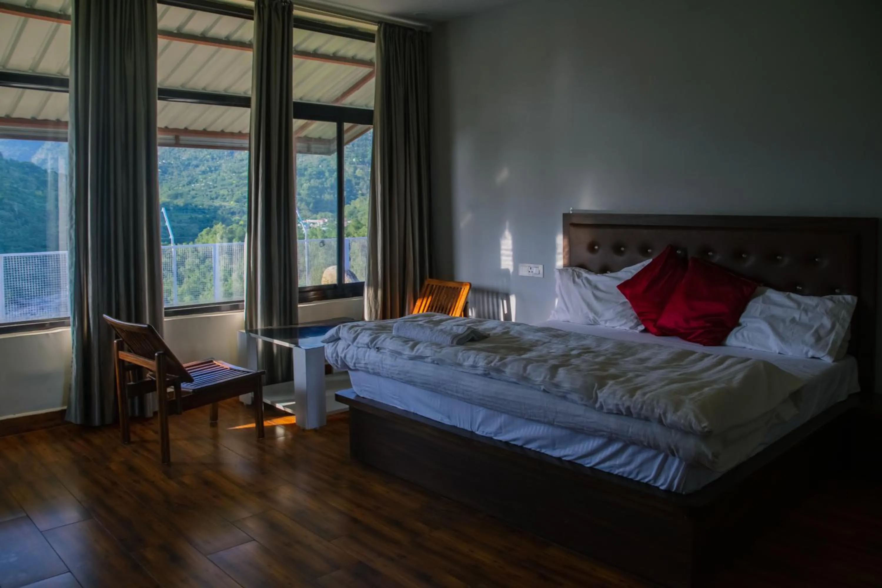 Bed in Dhauladhar View Village Resort