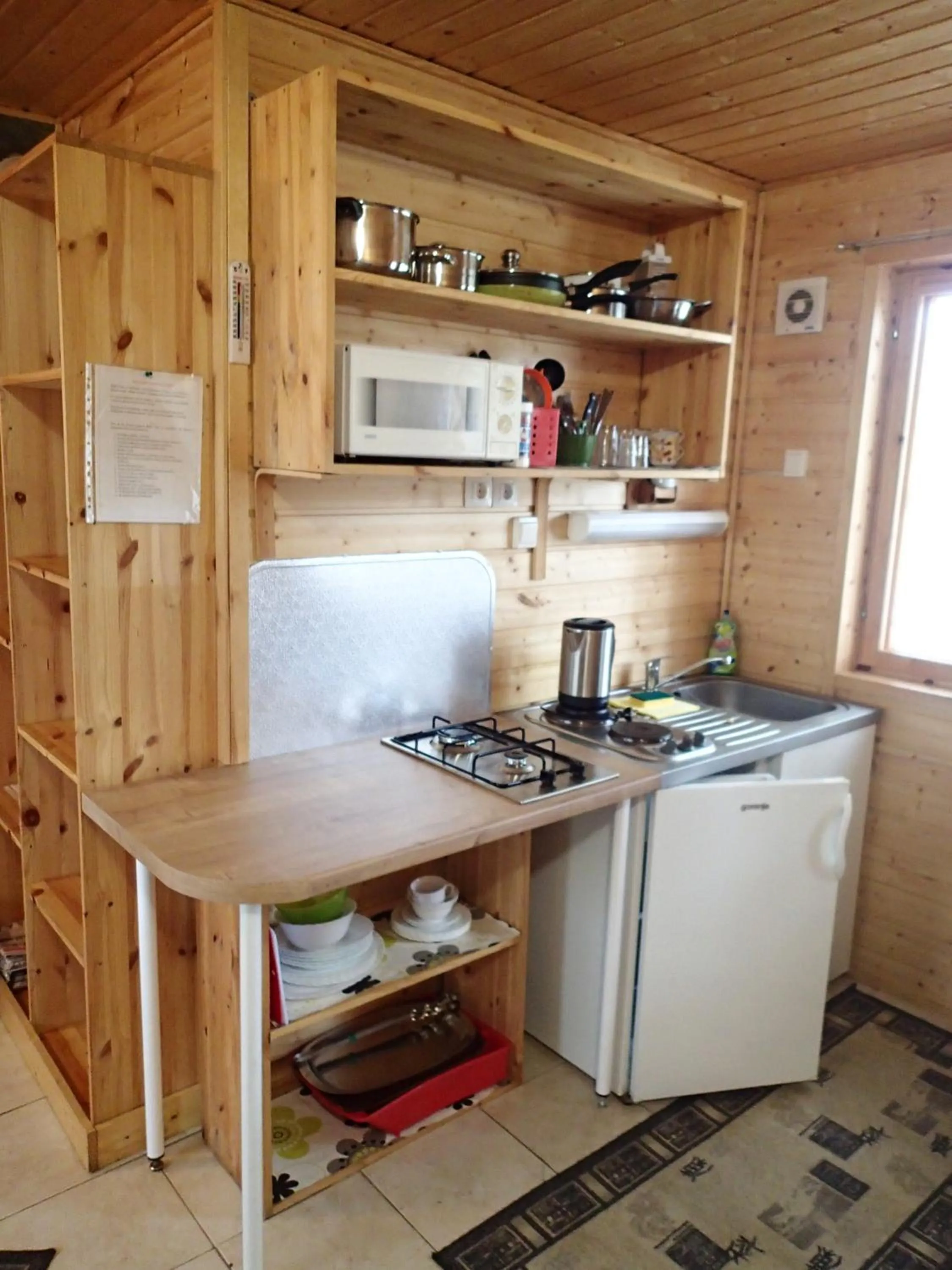 Kitchen or kitchenette in Lomasaaret Cottages