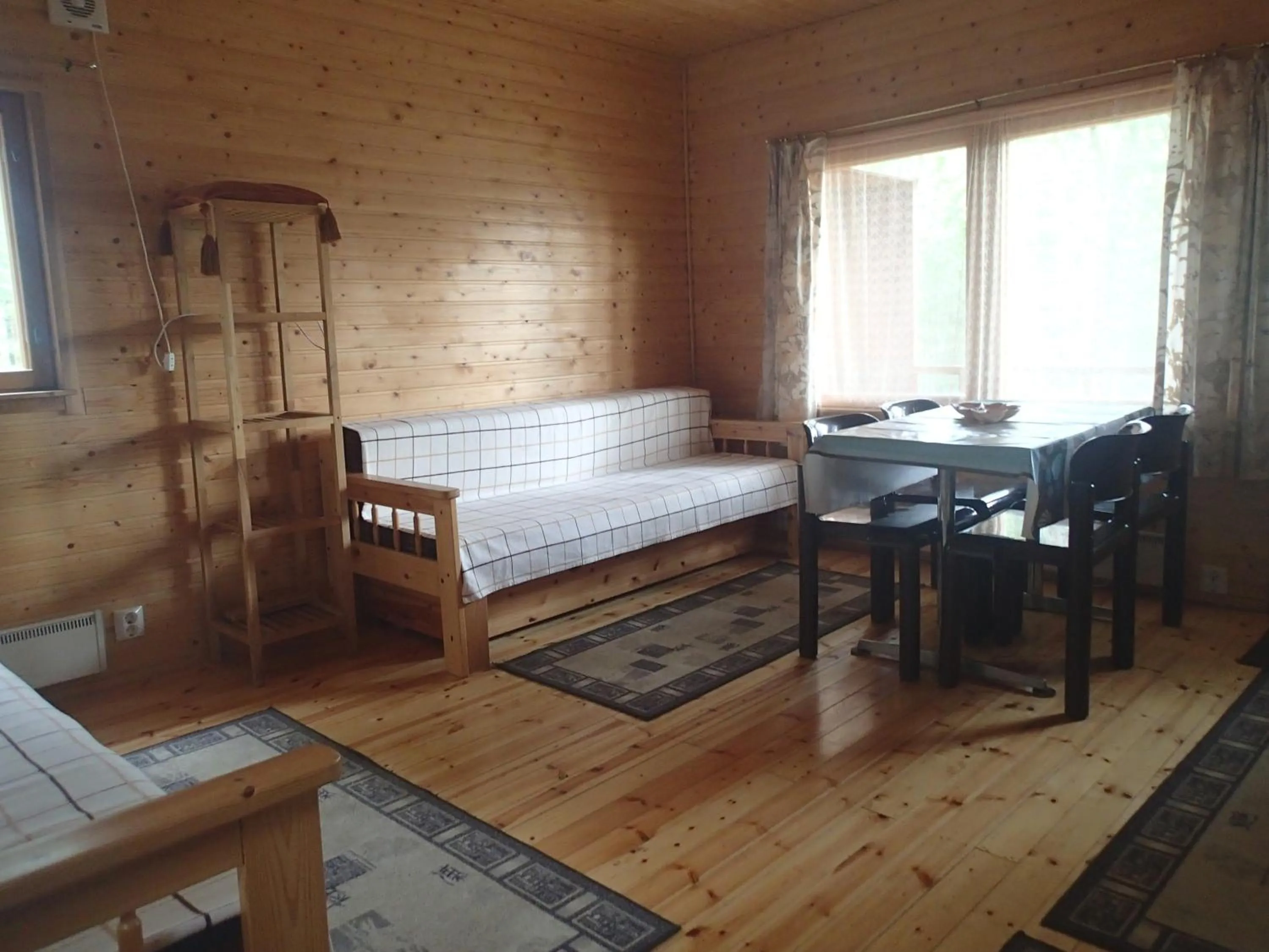 Photo of the whole room, Bed in Lomasaaret Cottages
