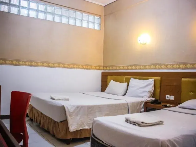Deluxe Family Room in Hotel Sukamulya Pasteur Deluxe Family Room in Hotel Sukamulya Pasteur