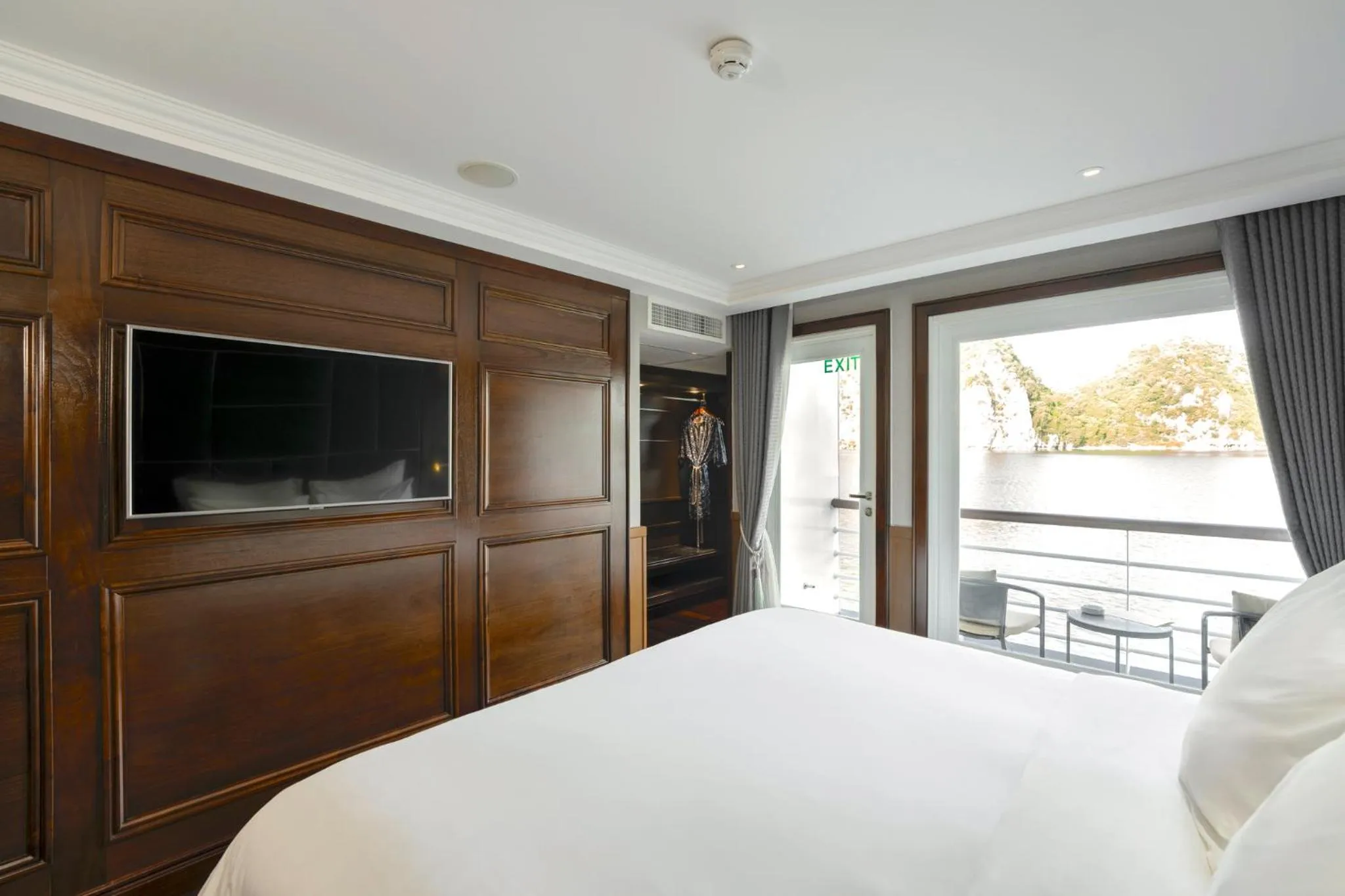 Photo of the whole room, Bed in Ambassador Signature Cruise - Lan Ha Bay