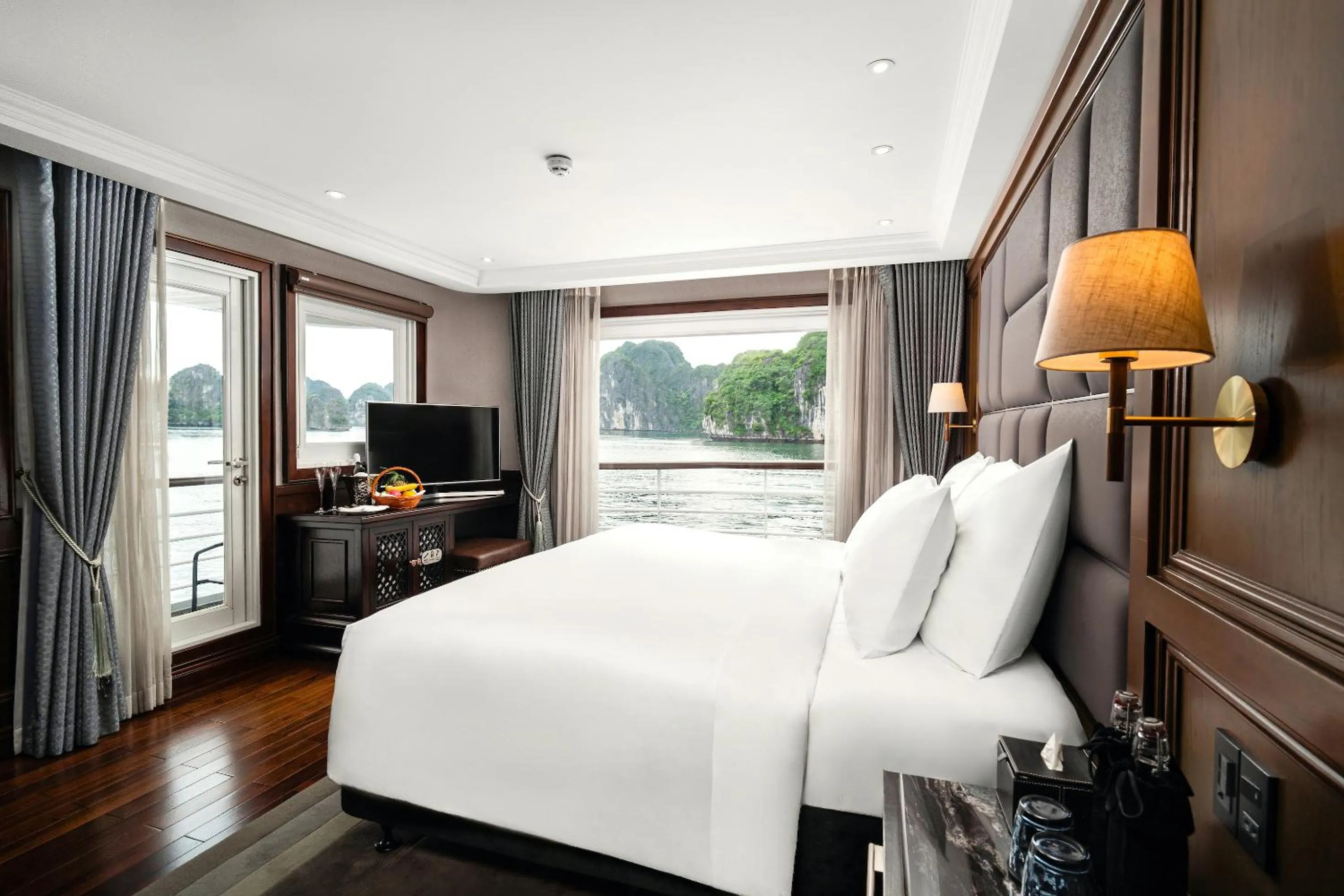 Photo of the whole room, Bed in Ambassador Signature Cruise - Lan Ha Bay
