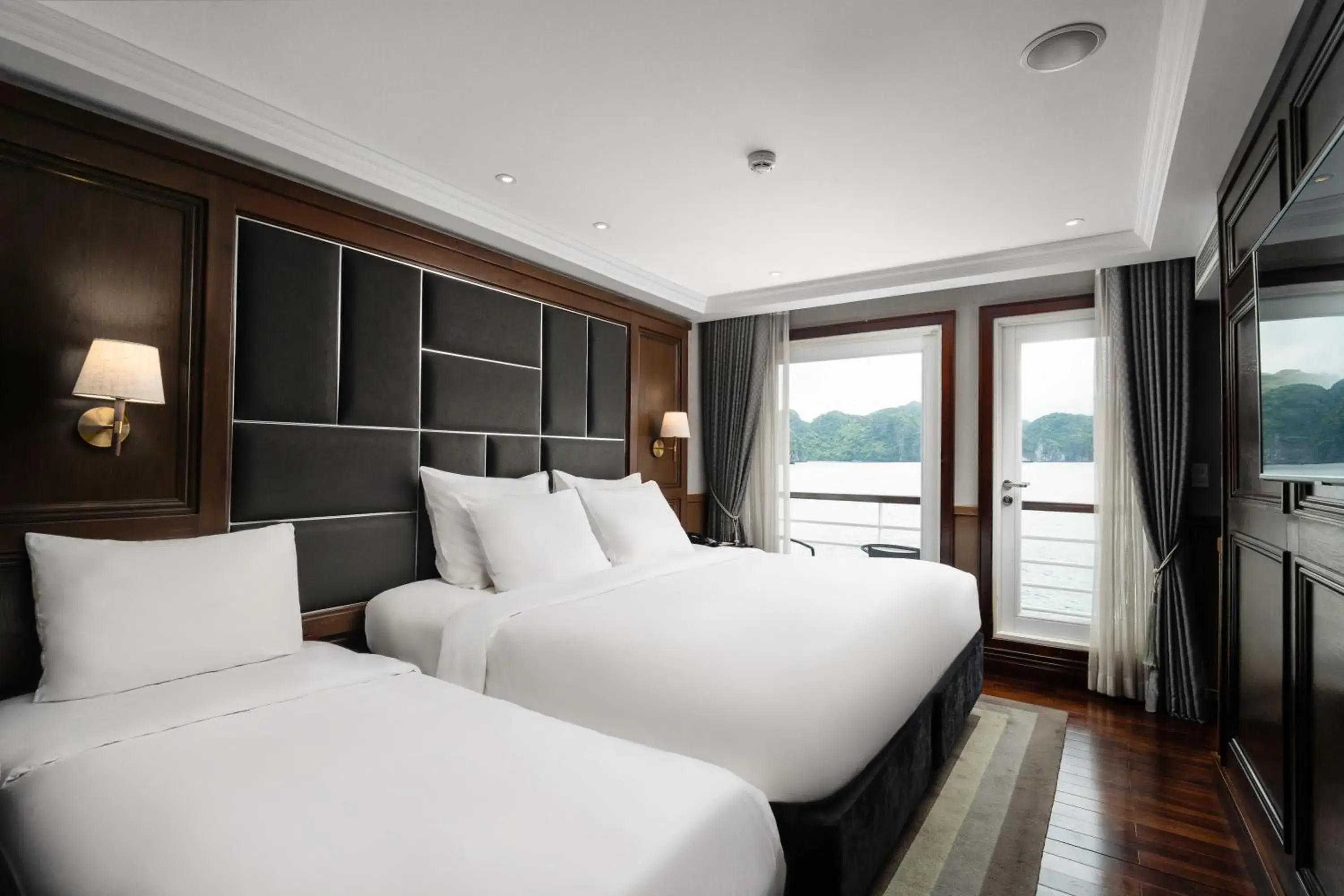 Triple Room with Balcony in Ambassador Signature Cruise - Lan Ha Bay Triple Room with Balcony in Ambassador Signature Cruise - Lan Ha Bay