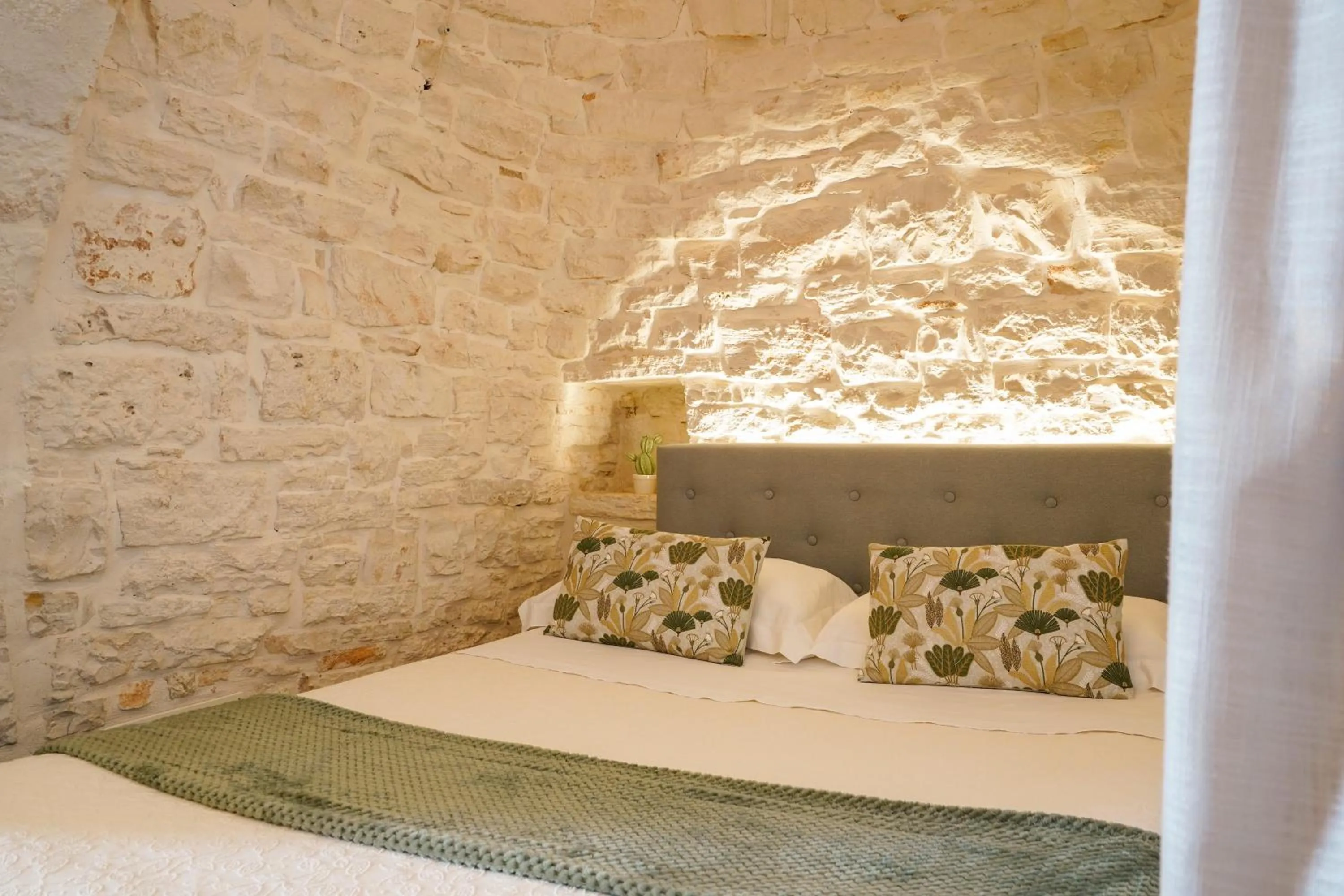 Bed in Trulli di Zia Vittoria
