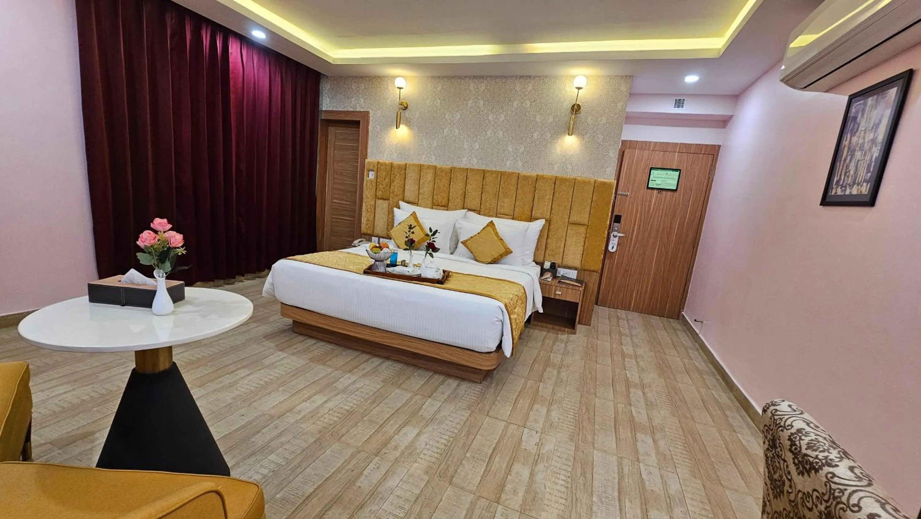 Photo of the whole room, Bed in The Royal Bihar