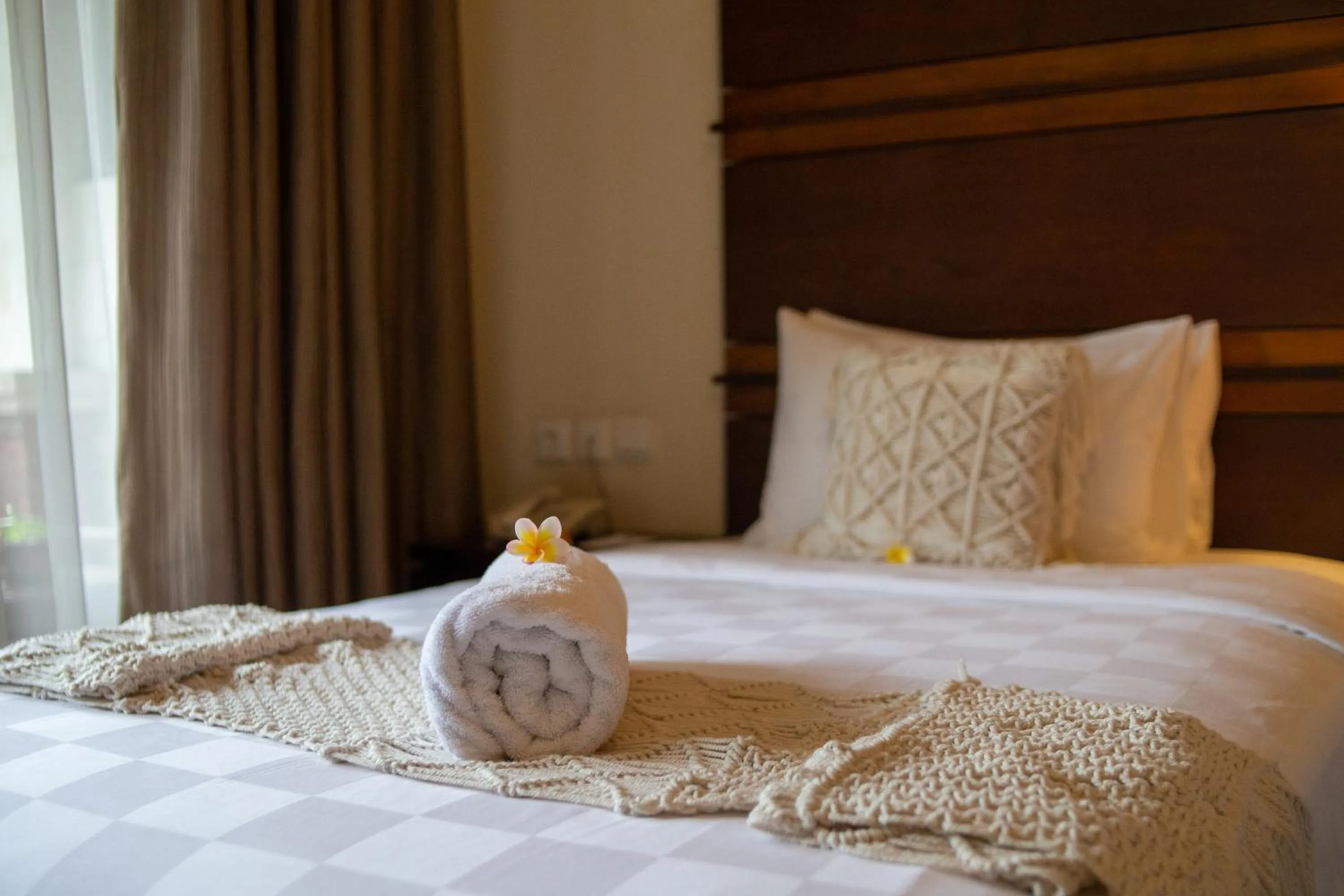 Bed in Awatara Boutique Resort Ubud