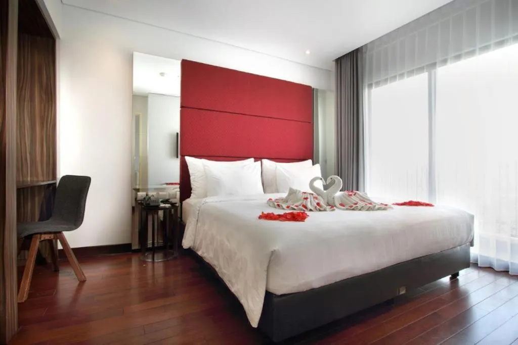 Bed in HELIOS HOTEL & CONVENTION