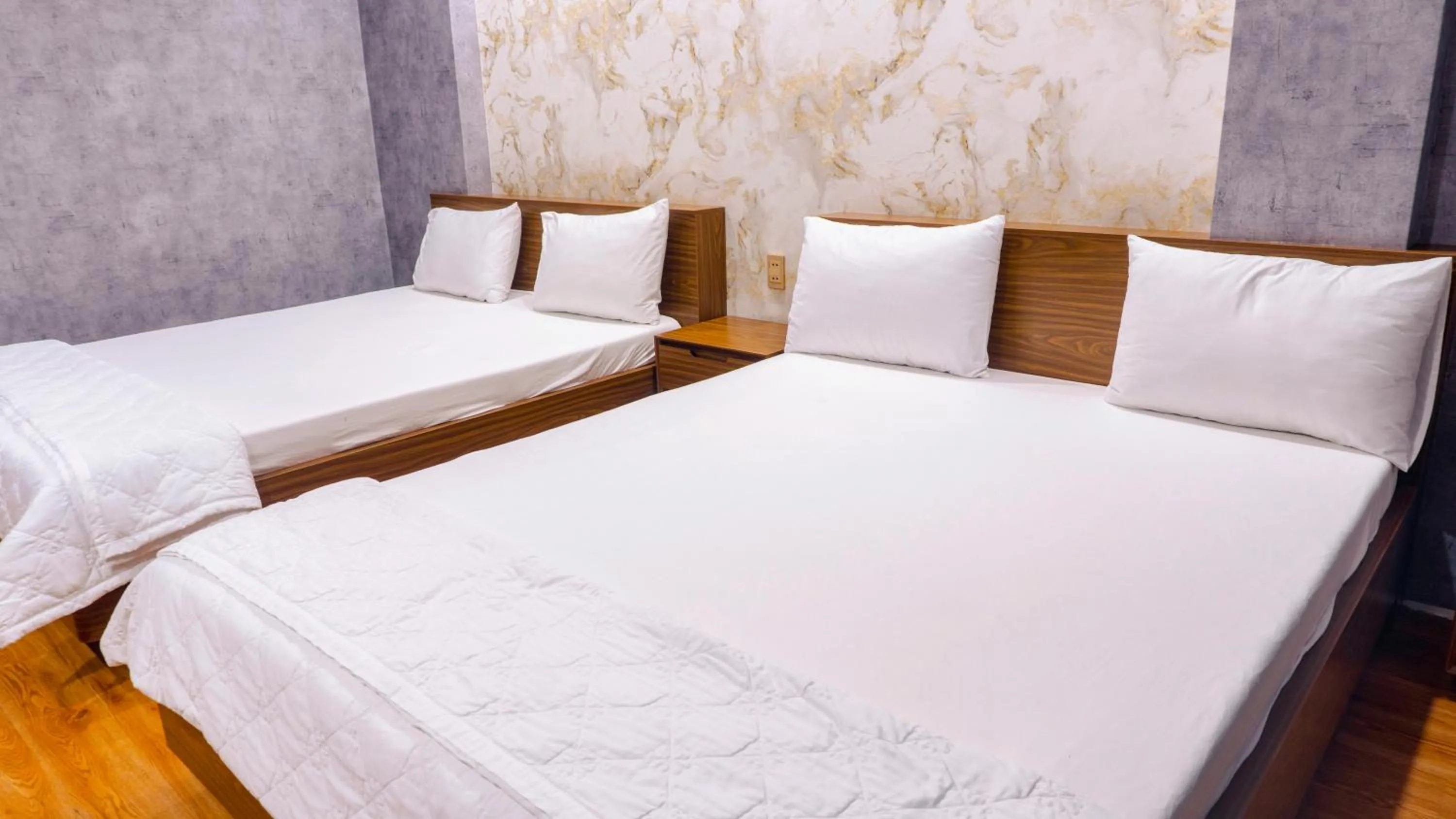Bed in Thanh Binh Premium Hotel