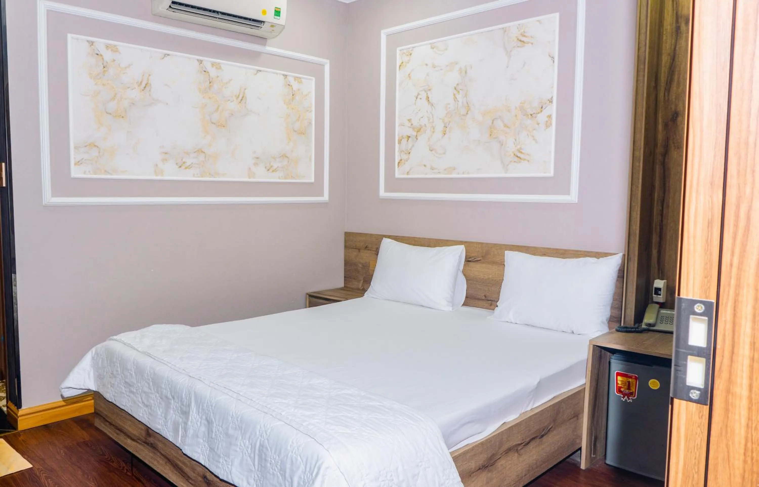 Bed in Thanh Binh Premium Hotel