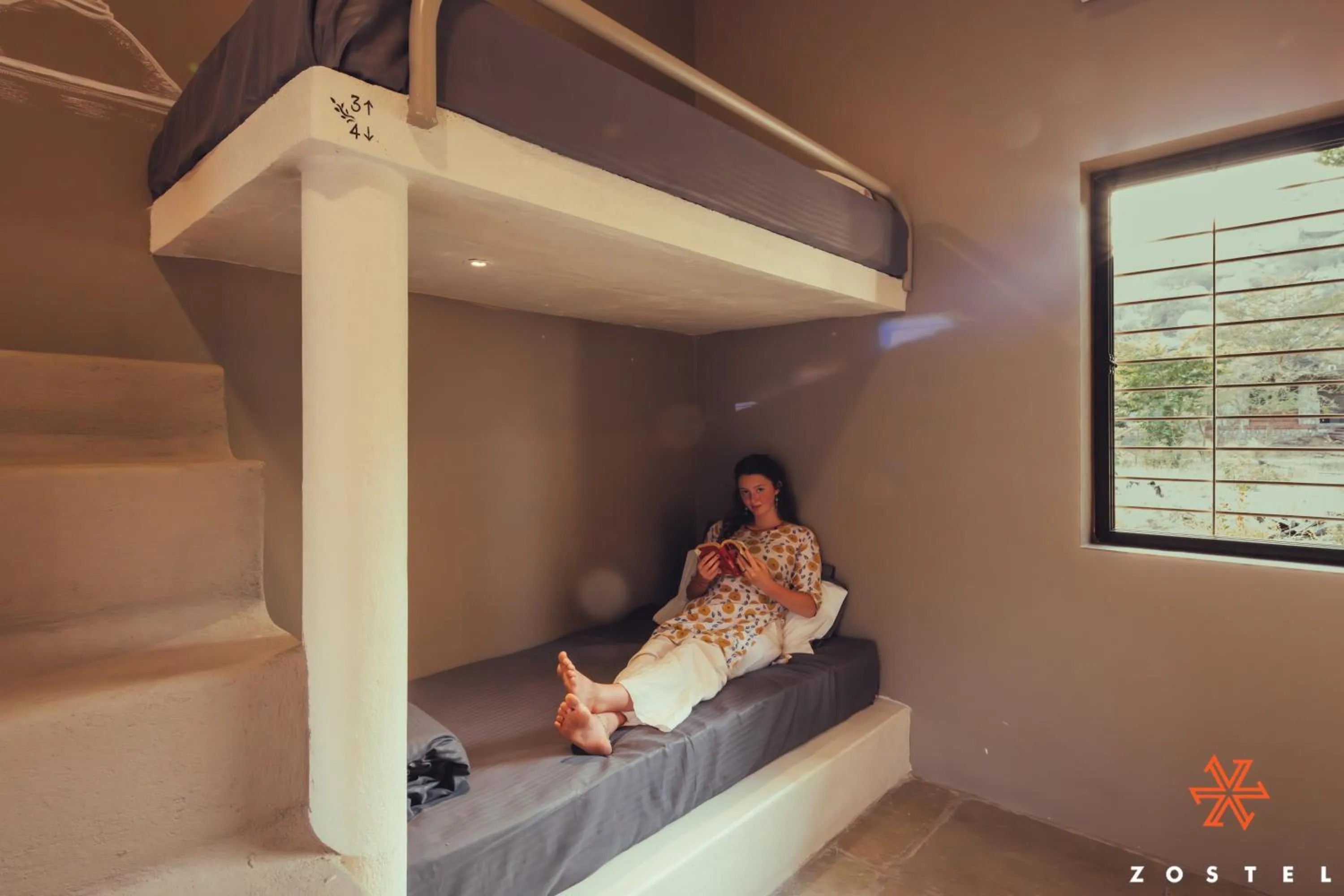 Bed in Zostel Hampi, Gangavathi