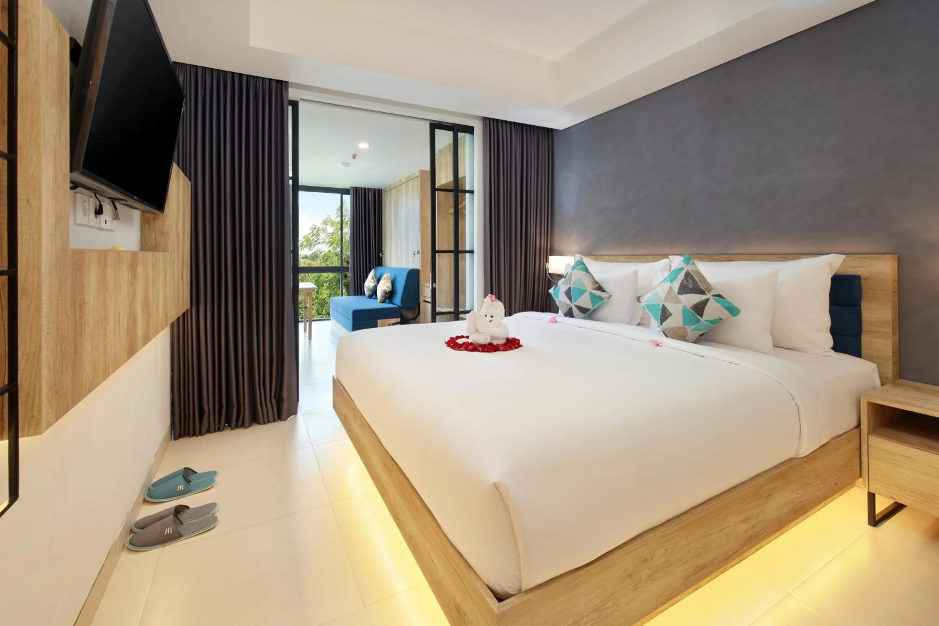 Communal lounge/ TV room, Bed in Anagata Hotels and Resorts Tanjung Benoa