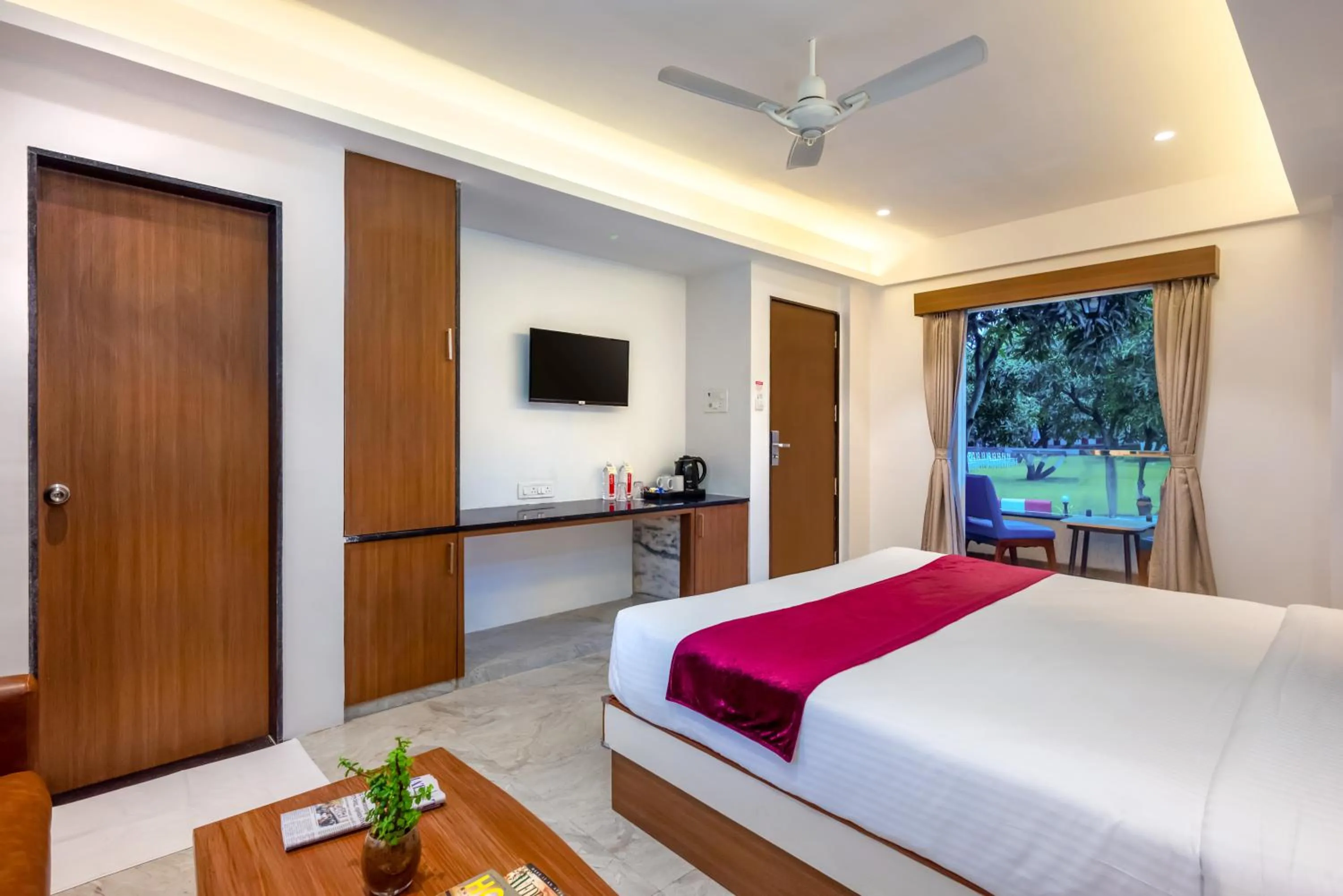 Bed in Freesia Resort by Express Inn
