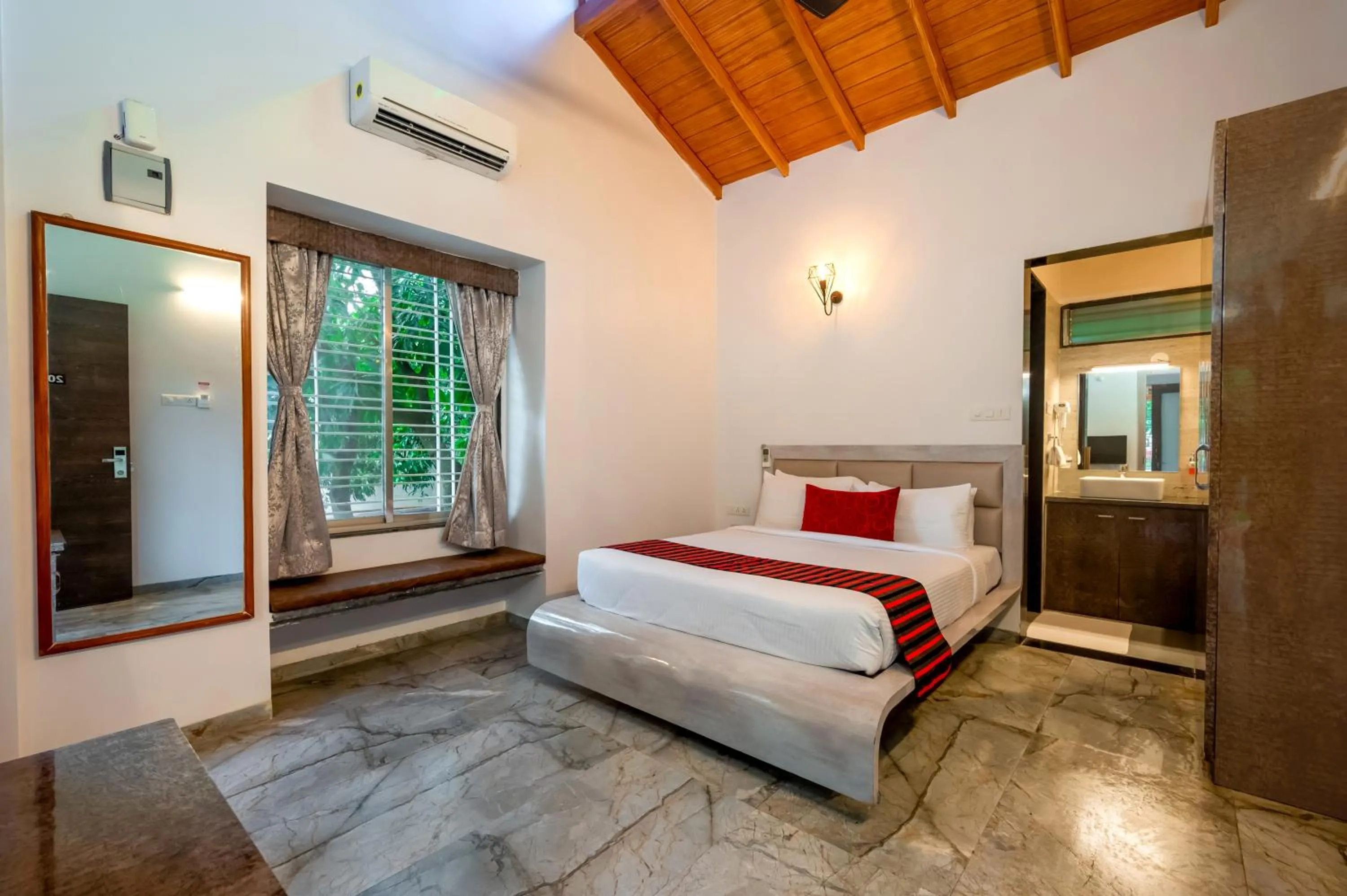 Bed in Freesia Resort by Express Inn