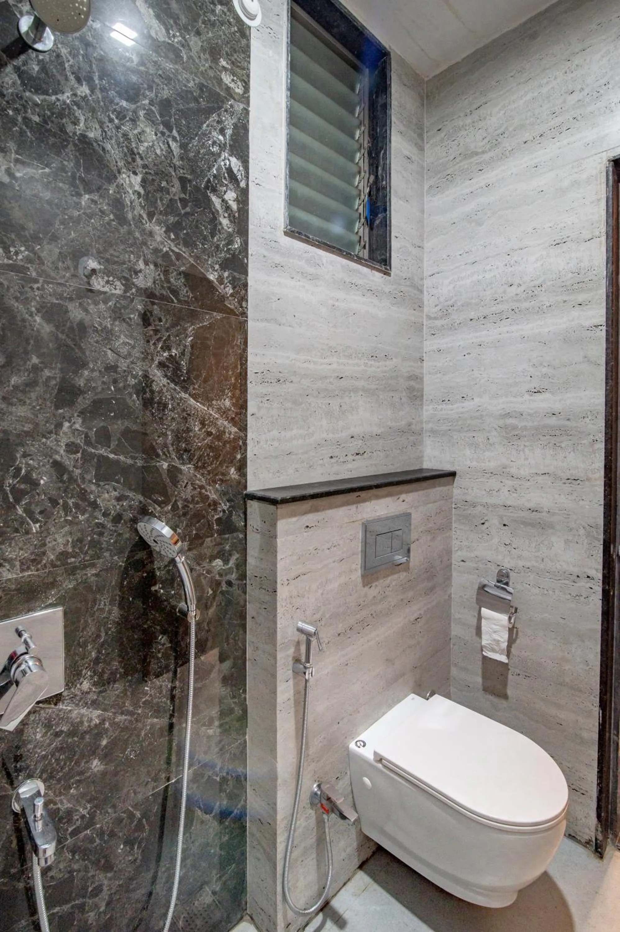 Shower in Freesia Resort by Express Inn