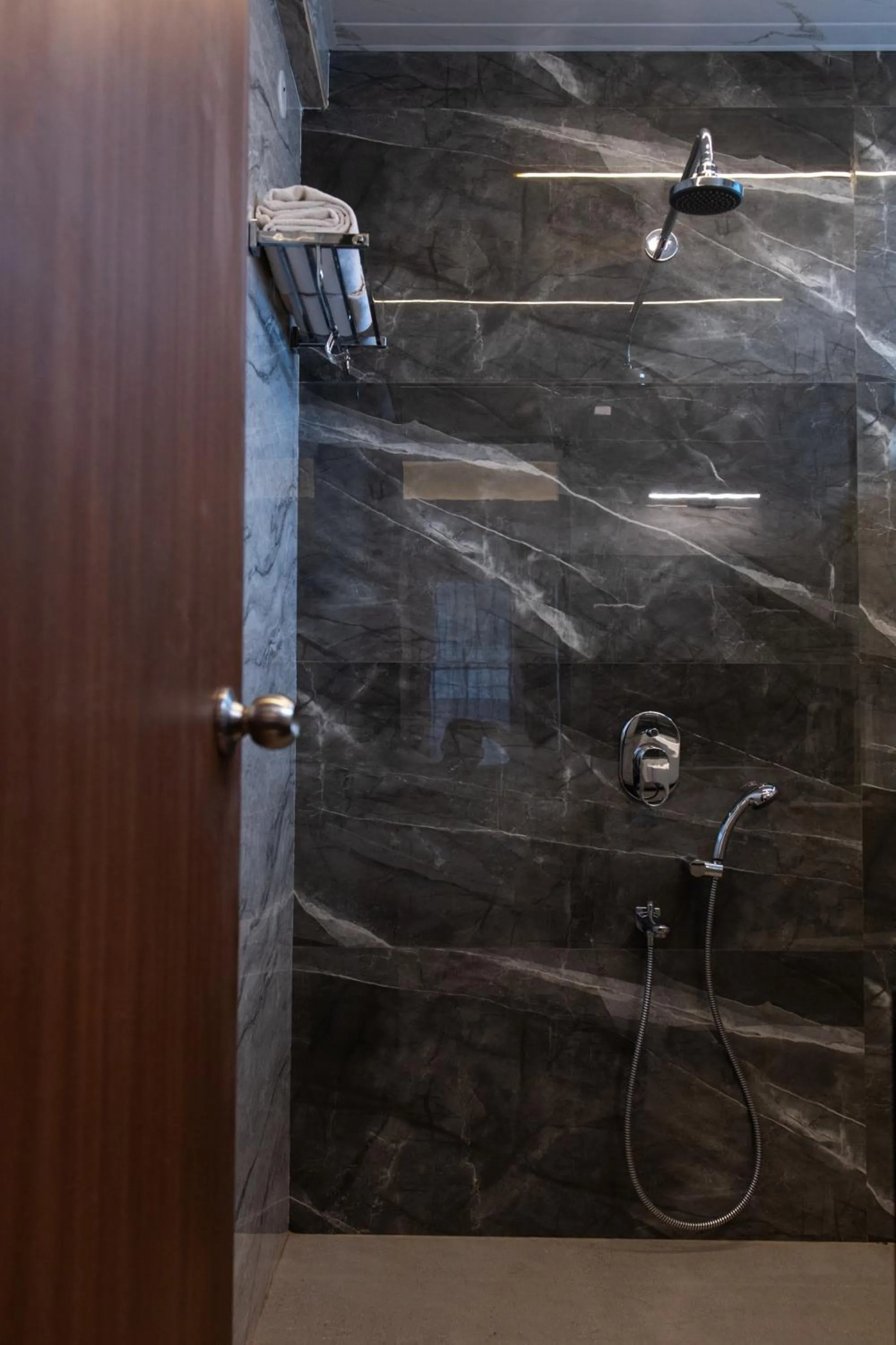 Shower in Freesia Resort by Express Inn