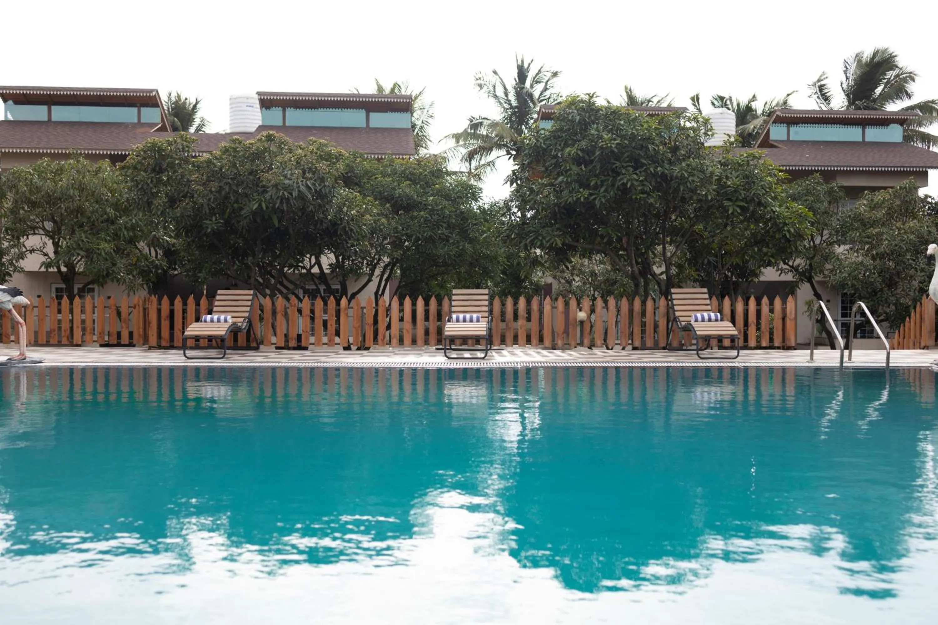 Swimming pool in Freesia Resort by Express Inn