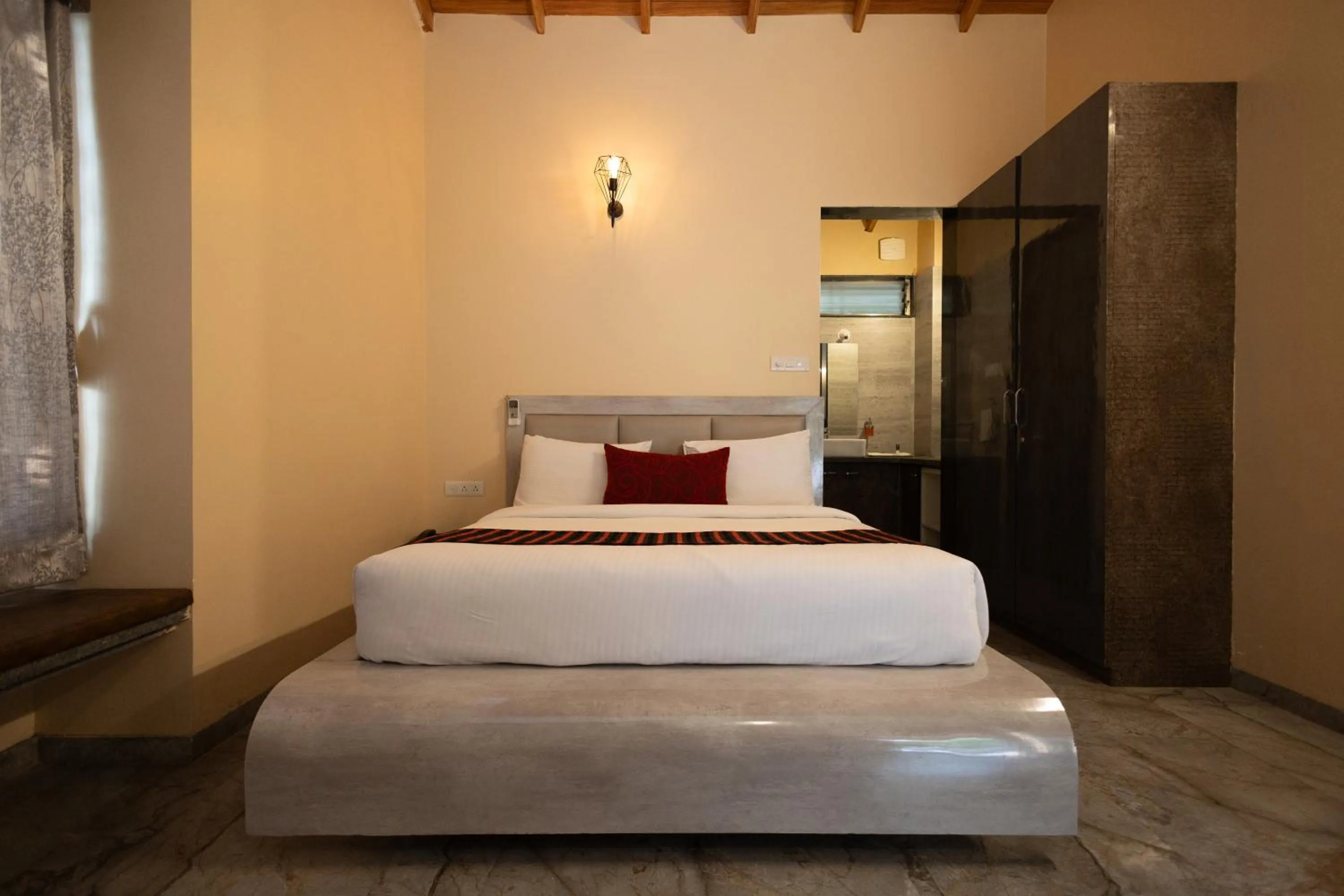 Bed in Freesia Resort by Express Inn