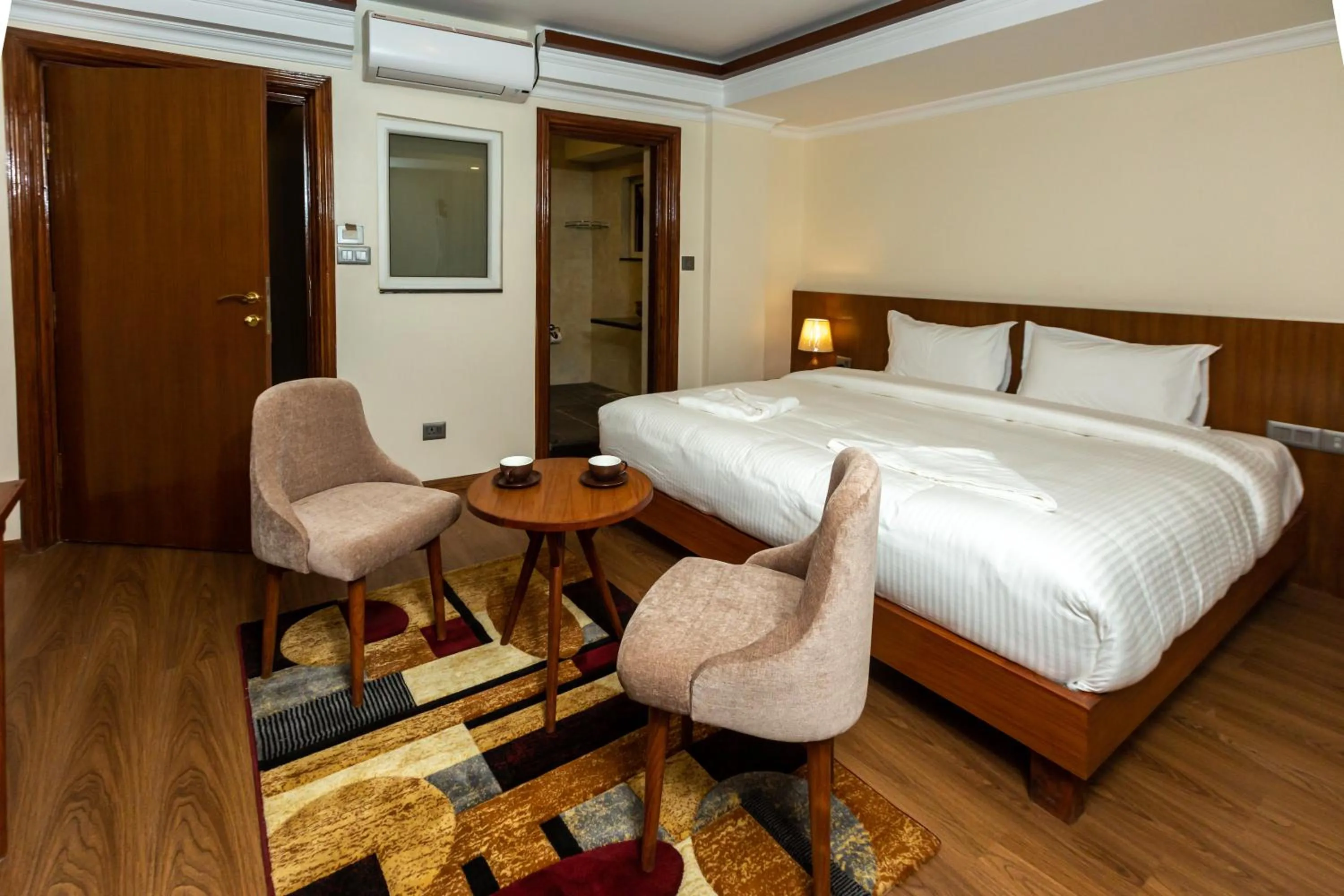 Bed in Darbar Heritage Inn