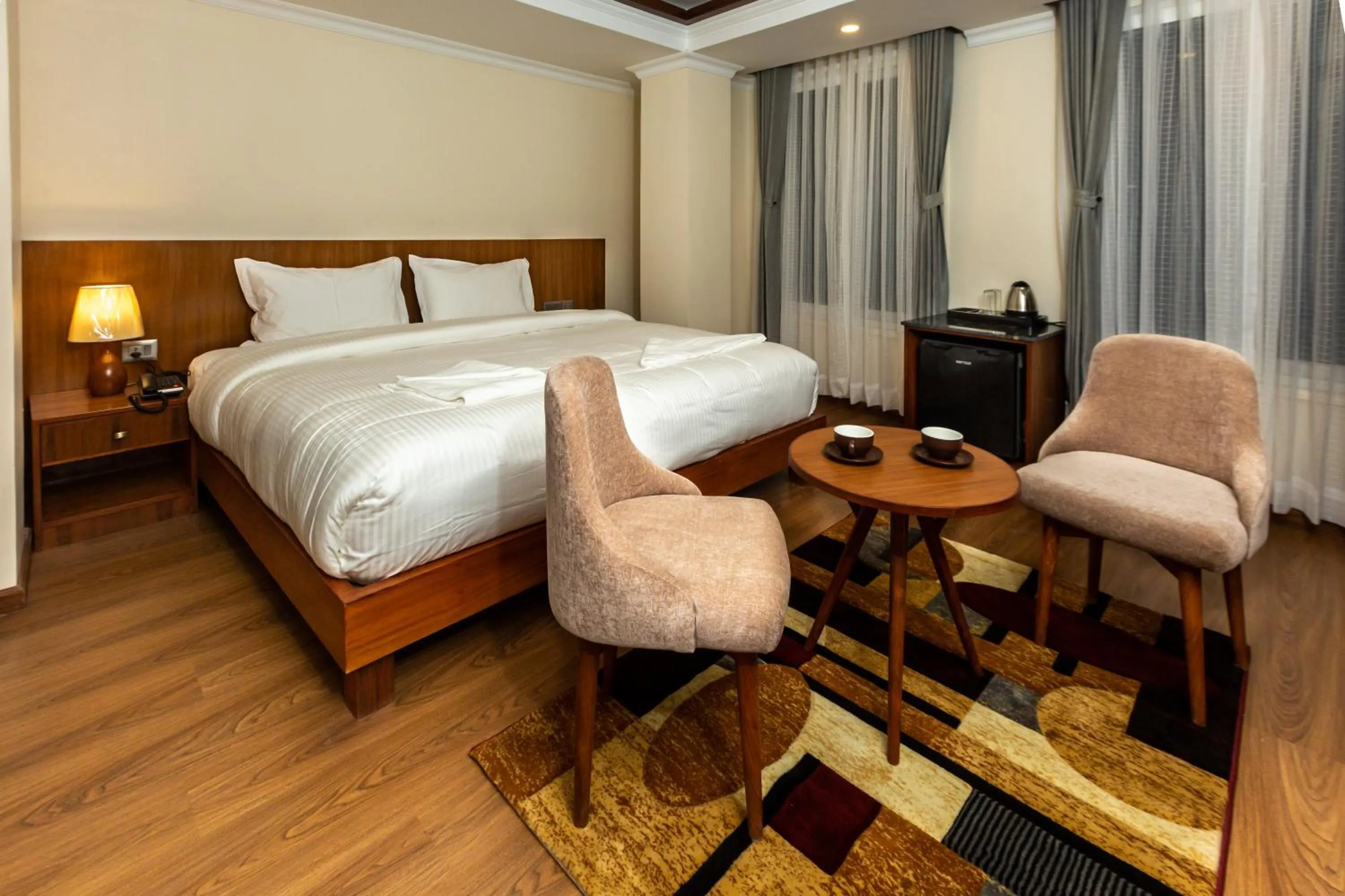 Bed in Darbar Heritage Inn