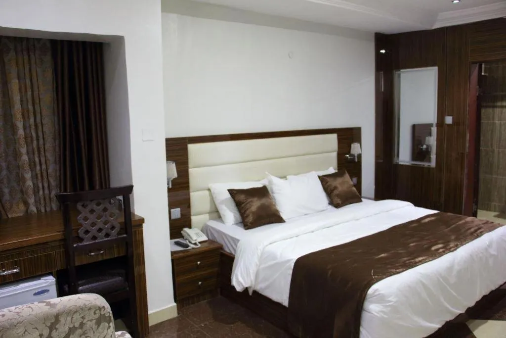 Bed in E-Suites Hotel, Abuja
