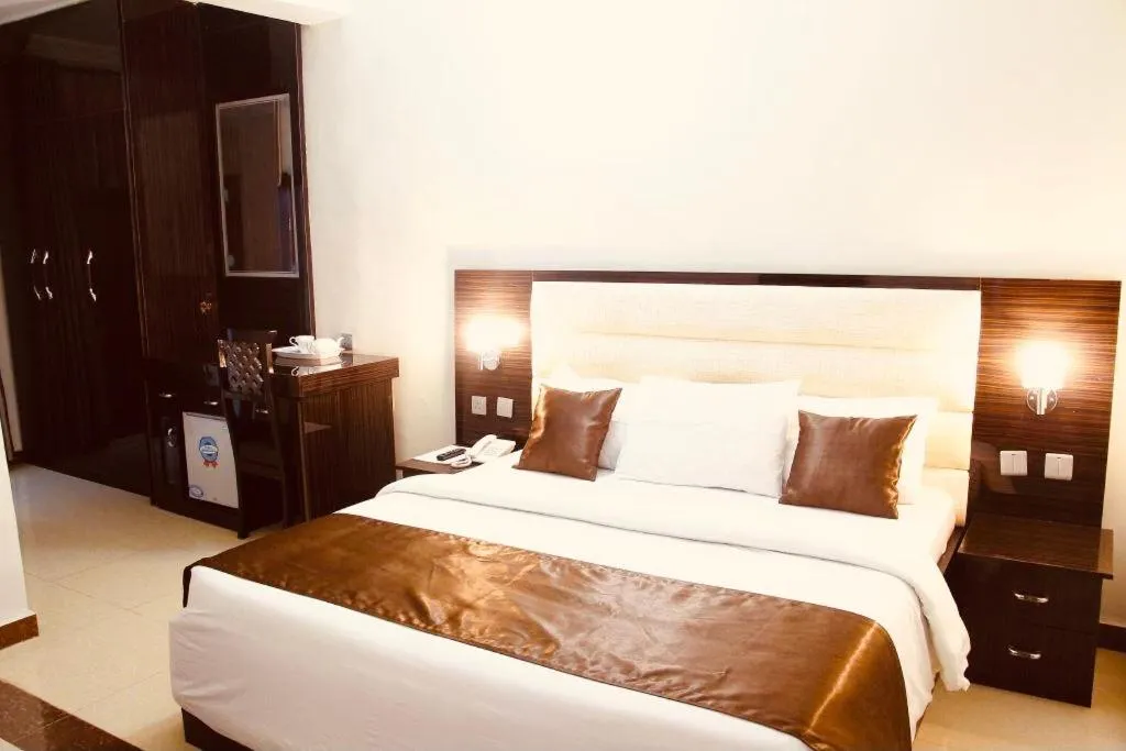 Bed in E-Suites Hotel, Abuja